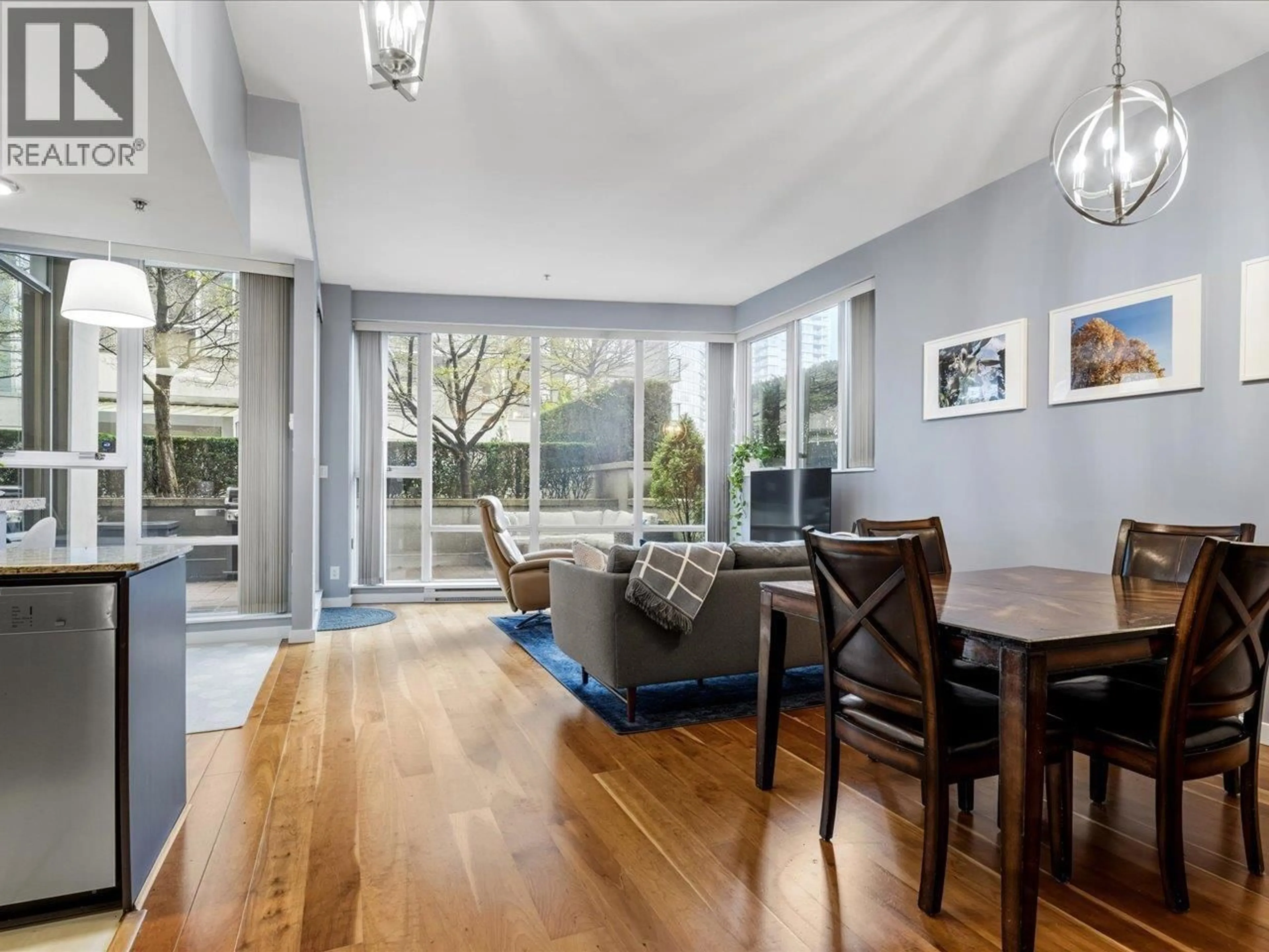 Living room with furniture, wood/laminate floor for 101 - 550 PACIFIC STREET, Vancouver British Columbia V6Z3G2