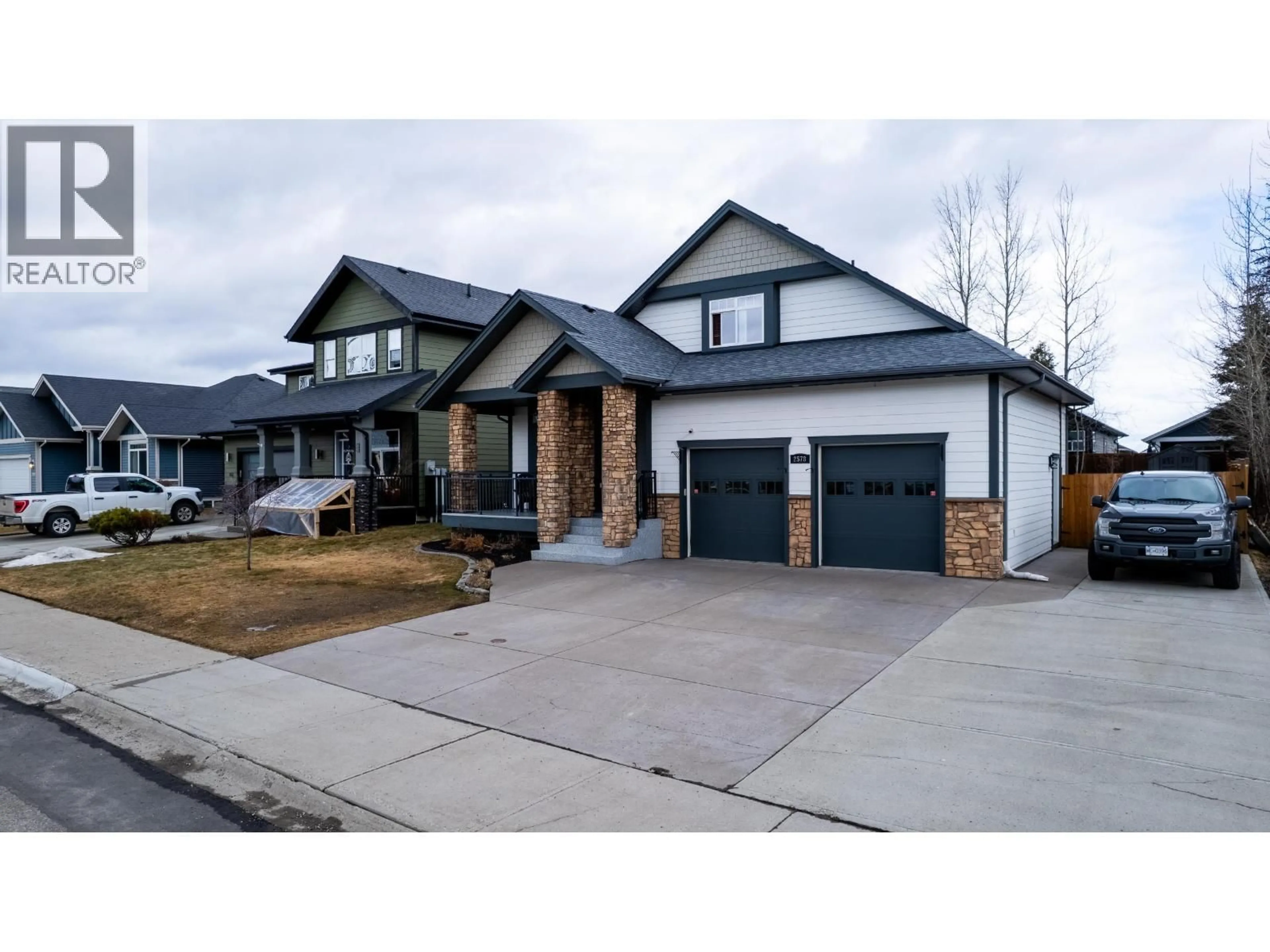 Home with brick exterior material, street for 2578 MAURICE DRIVE, Prince George British Columbia V2N0B9