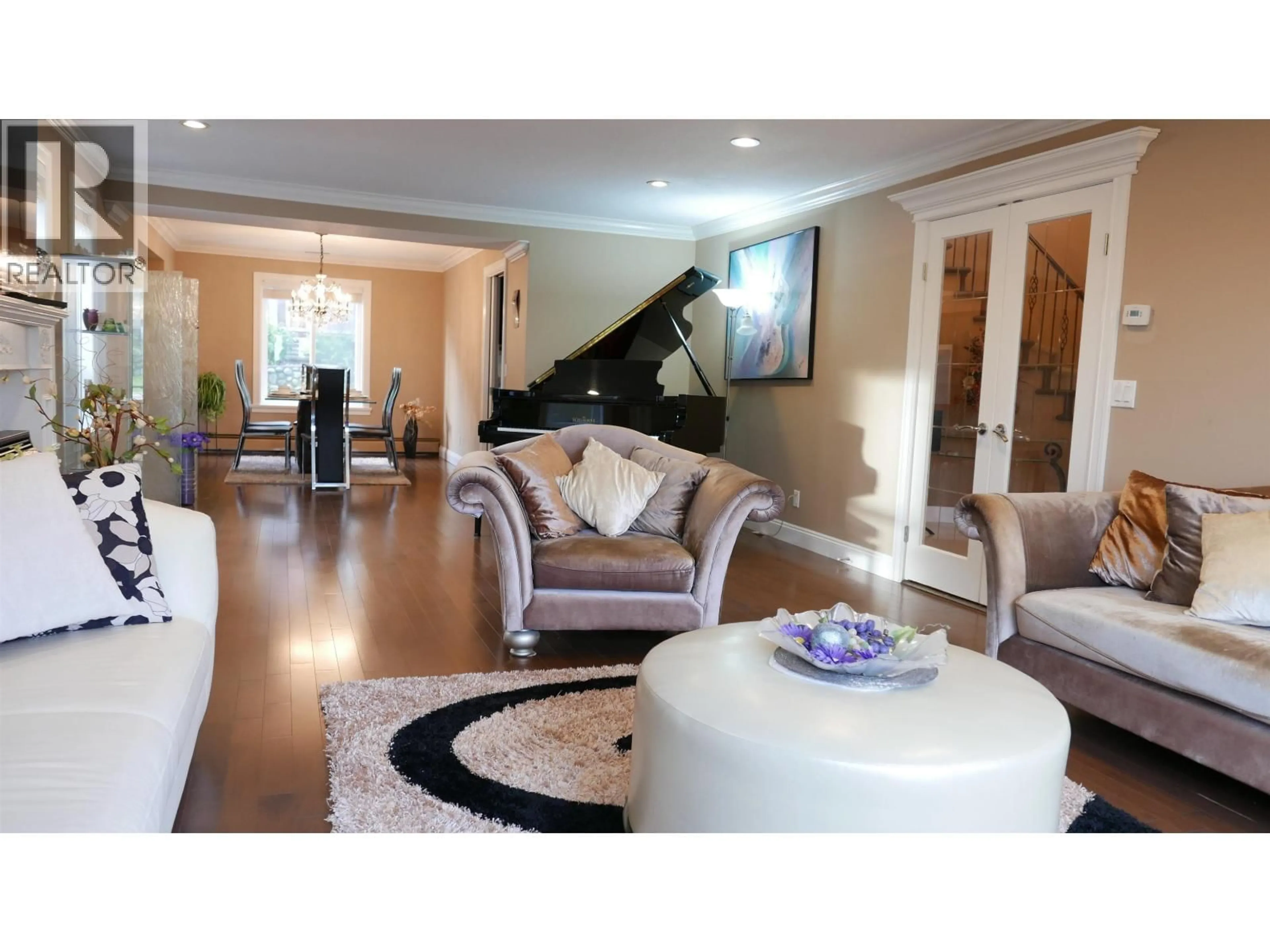 Living room with furniture, wood/laminate floor for 7625 AUBREY STREET, Burnaby British Columbia V5A1K6