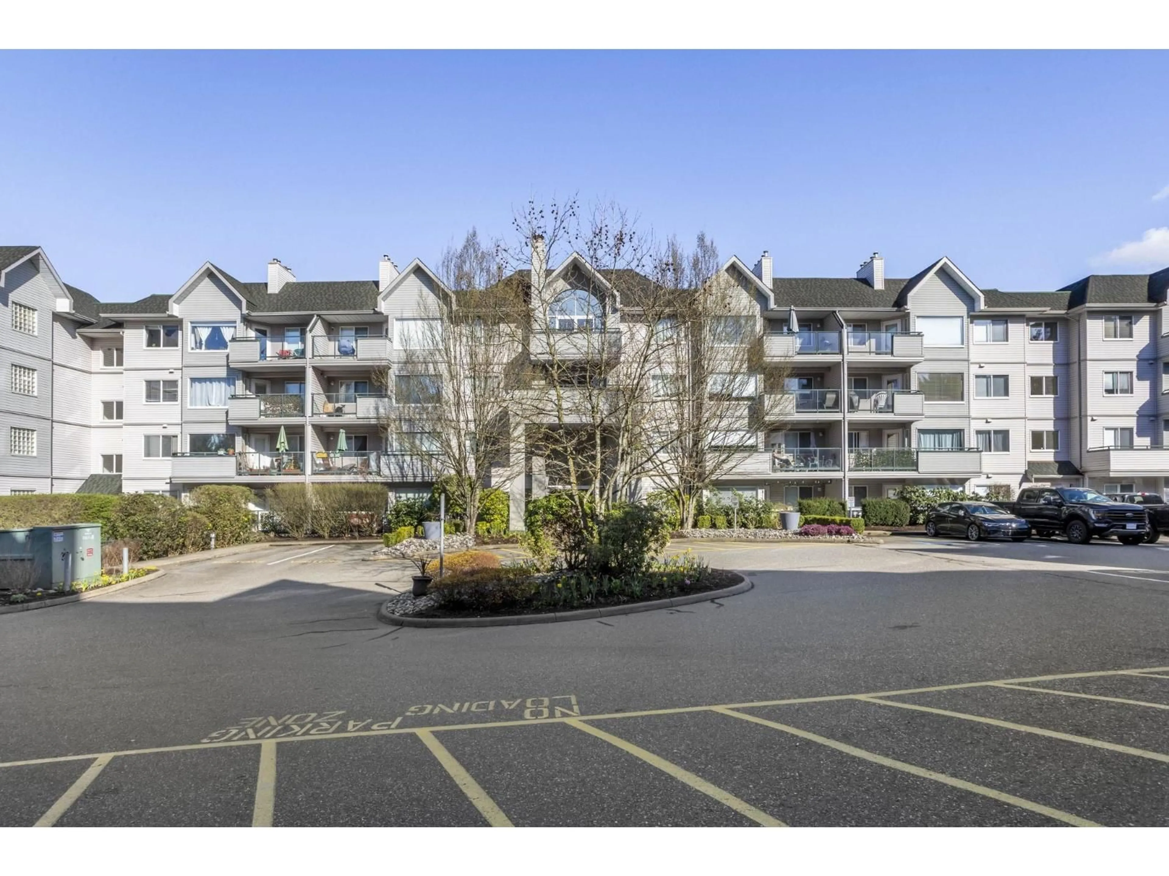 A pic from outside/outdoor area/front of a property/back of a property/a pic from drone, mountain view for 304 - 33718 KING ROAD, Abbotsford British Columbia V2S8J3