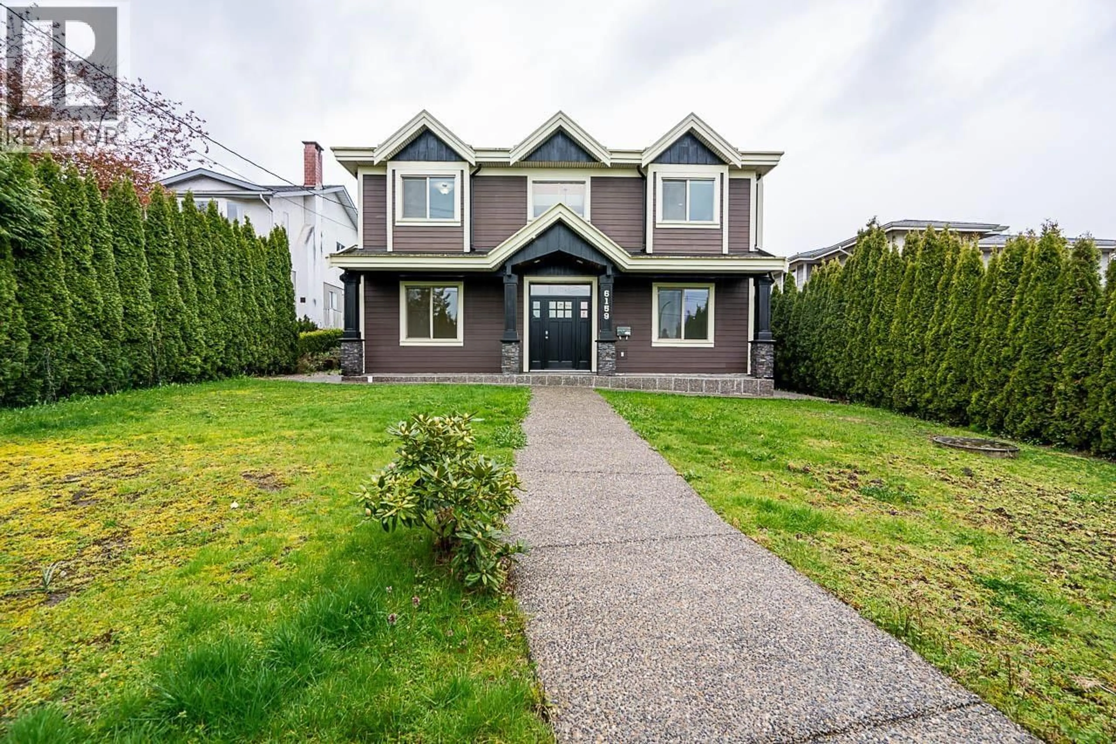 Home with vinyl exterior material, street for 6159 CANADA WAY, Burnaby British Columbia V5E3P1