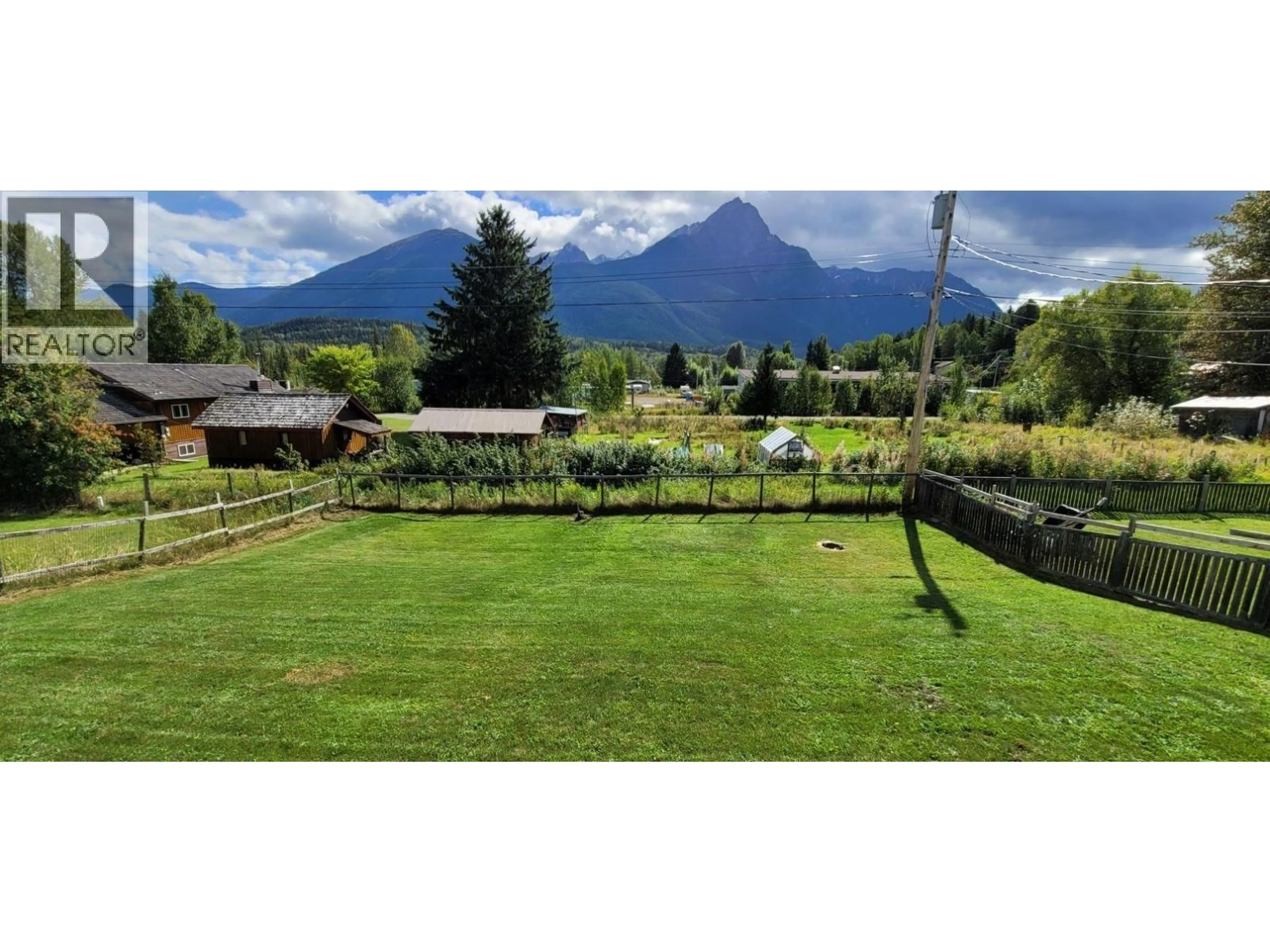A pic from outside/outdoor area/front of a property/back of a property/a pic from drone, mountain view for 4156 4TH AVENUE, New Hazelton British Columbia V0J2J0