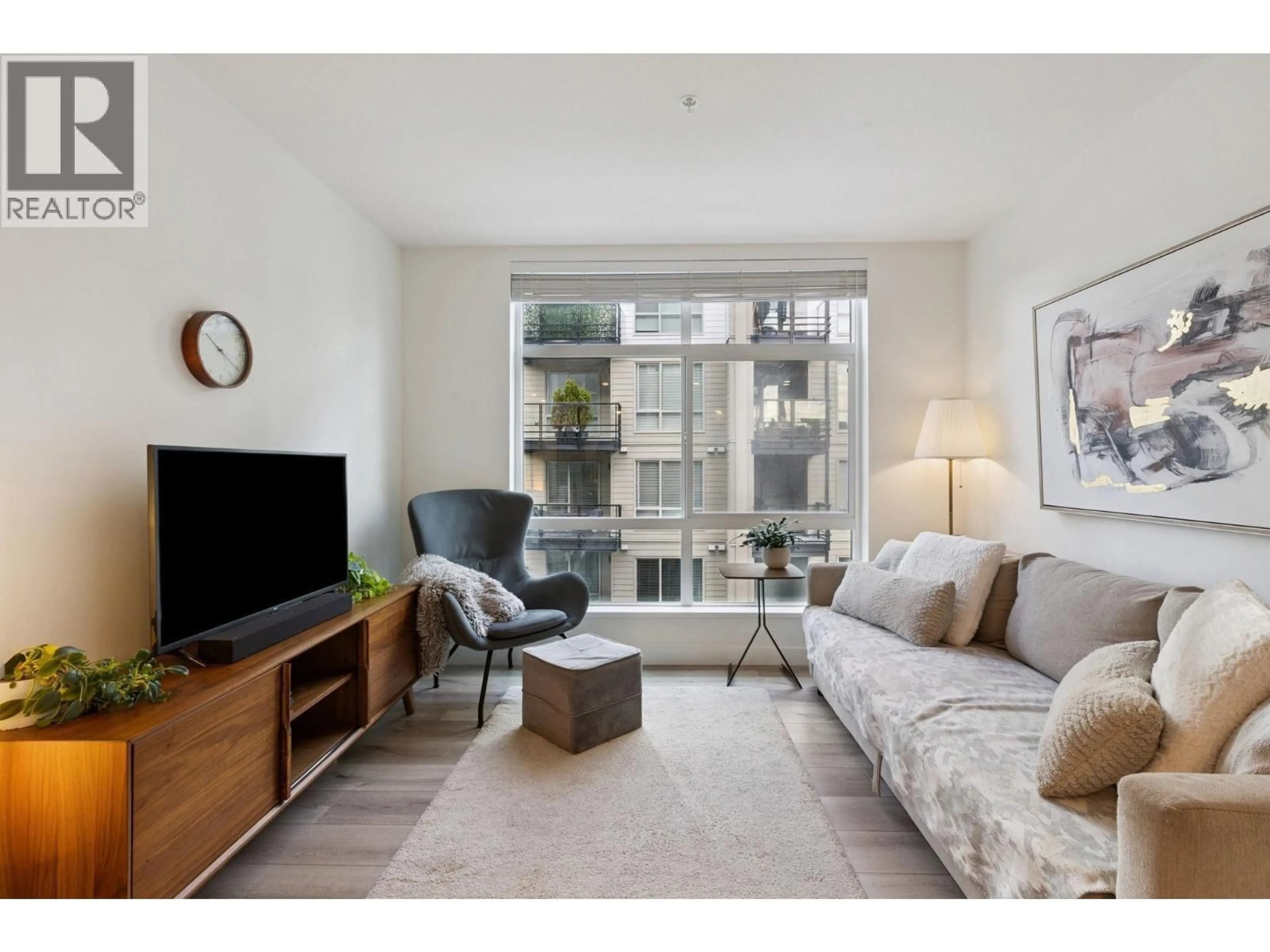 Living room with furniture, unknown for 309 - 128 8TH STREET, North Vancouver British Columbia V7L0H2