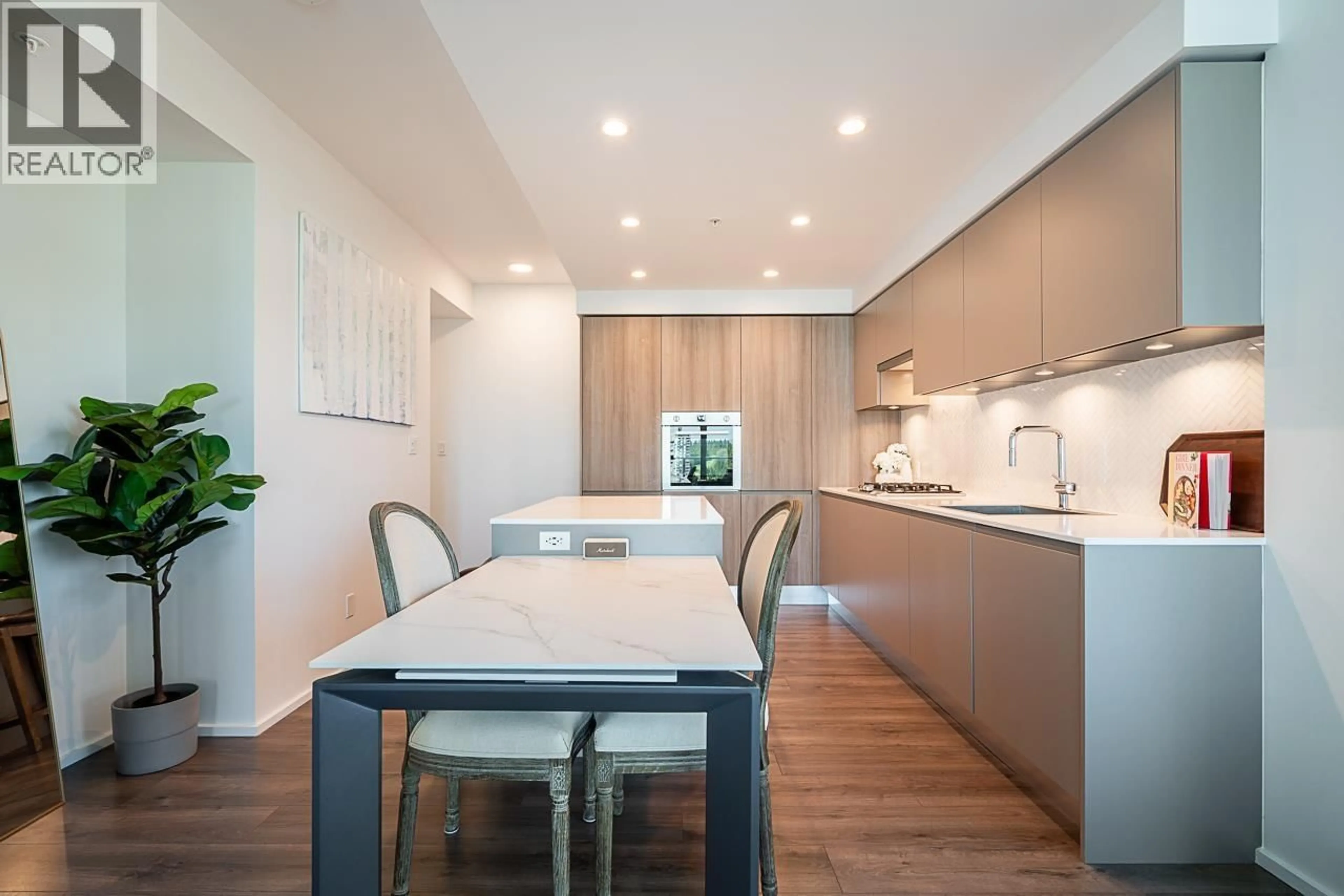 Contemporary kitchen, wood/laminate floor for 2401 - 3833 EVERGREEN PLACE, Burnaby British Columbia V3J0M2