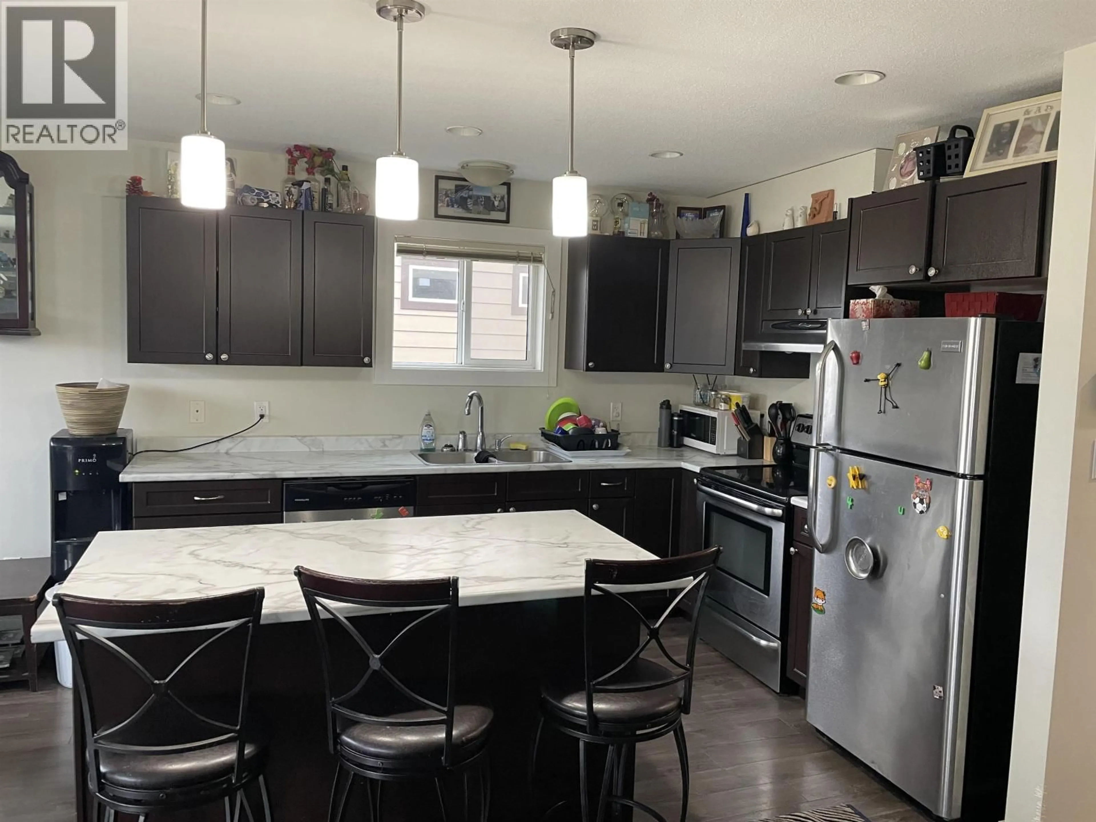 Open concept kitchen, unknown for 11112 104A AVENUE, Fort St. John British Columbia V1J0J3