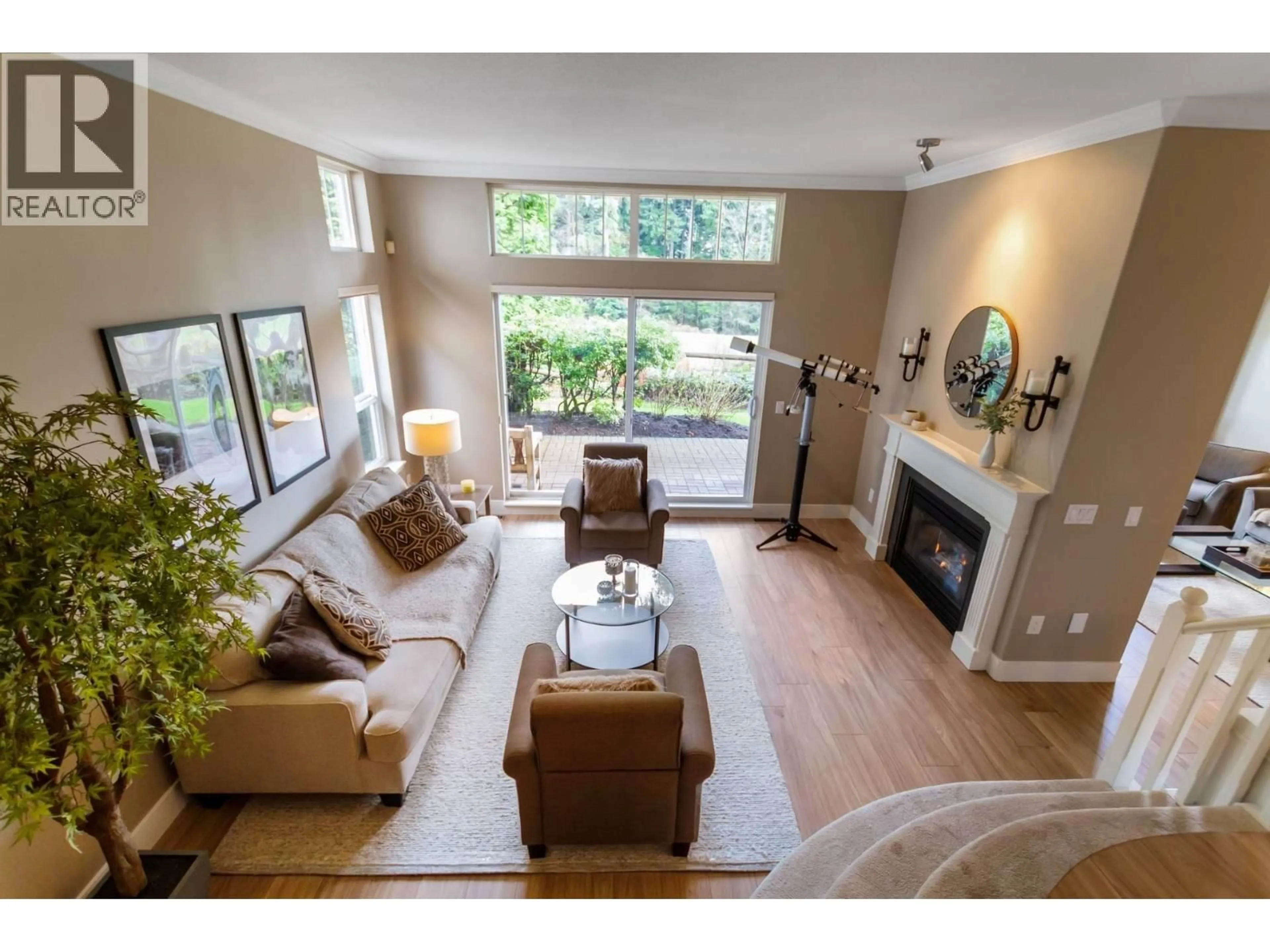 Living room with furniture, wood/laminate floor for 57 - 3405 PLATEAU BOULEVARD, Coquitlam British Columbia V3E3L7