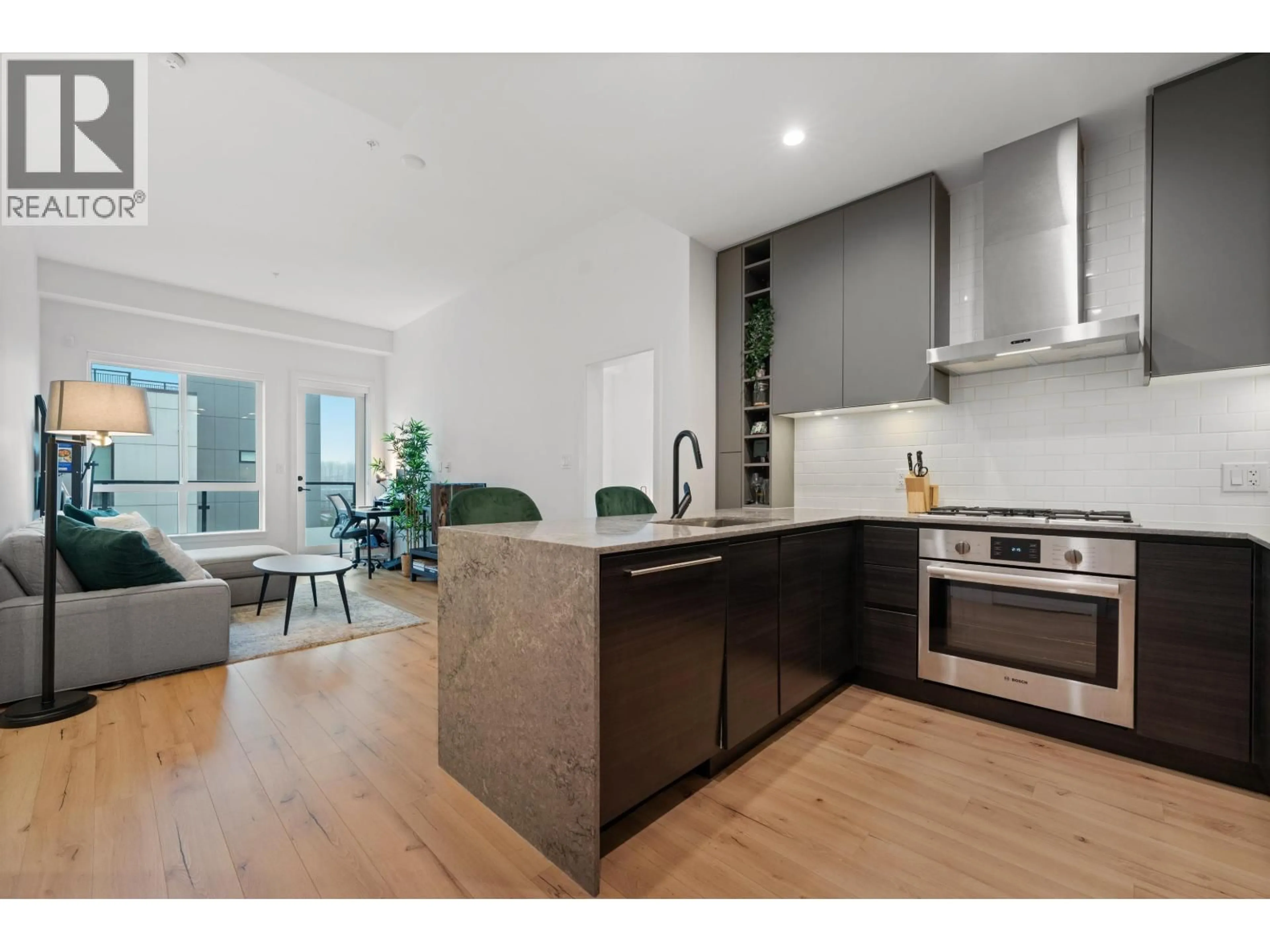 Open concept kitchen, wood/laminate floor for 621 - 3131 MURRAY STREET, Port Moody British Columbia V3H0L9