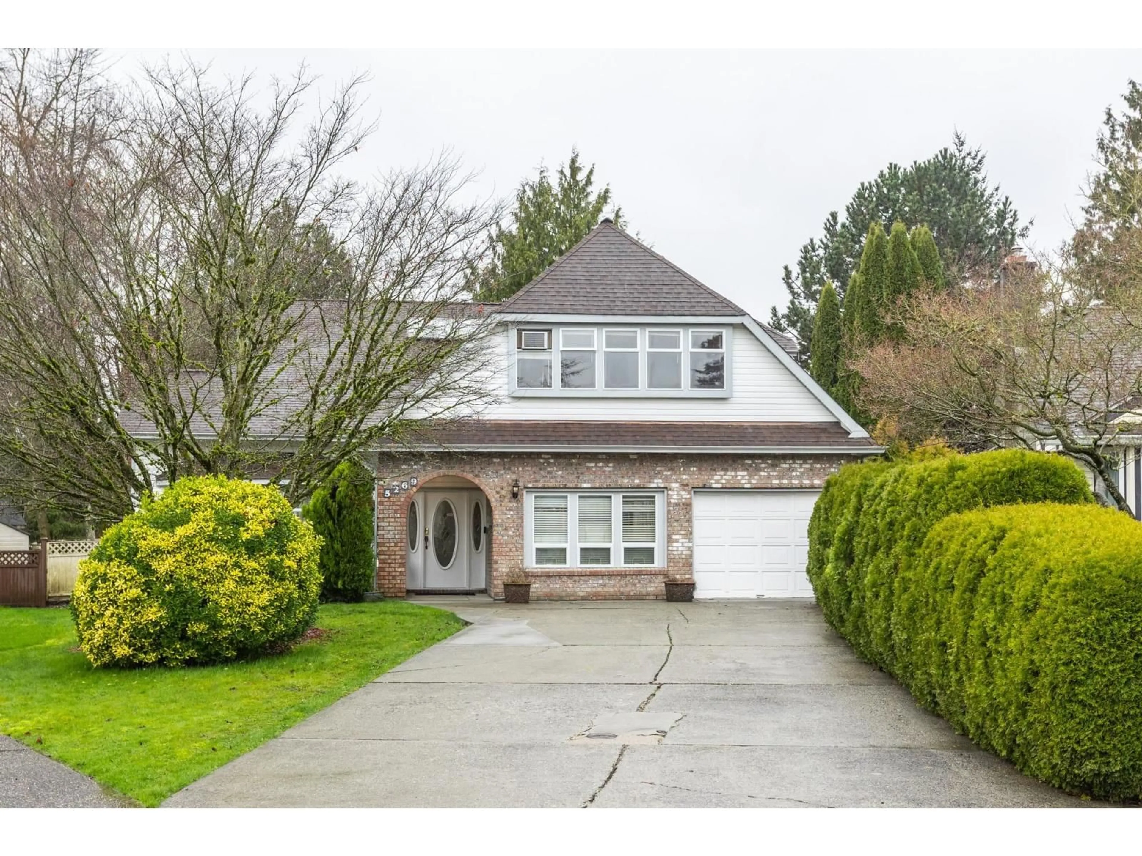 Home with vinyl exterior material, street for 5269 197A STREET, Langley British Columbia V3A7Y1