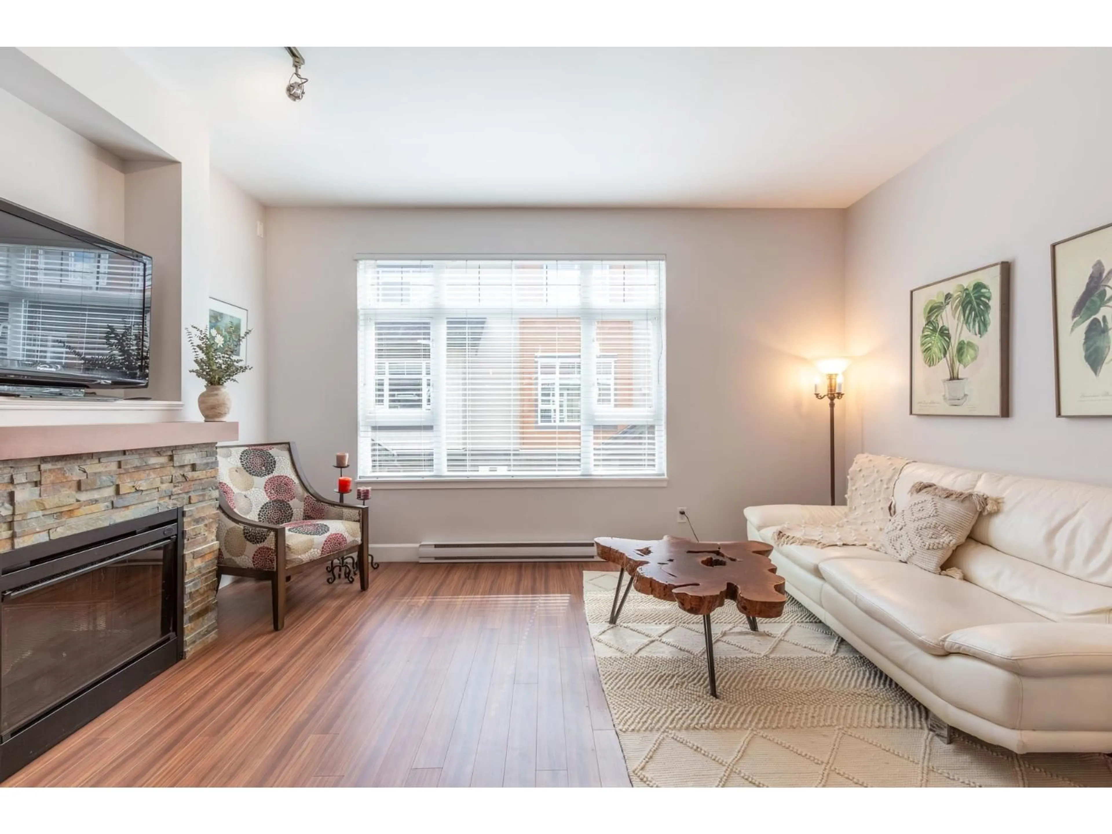 Living room with furniture, wood/laminate floor for 110 - 2979 156 STREET, Surrey British Columbia V3Z8V8