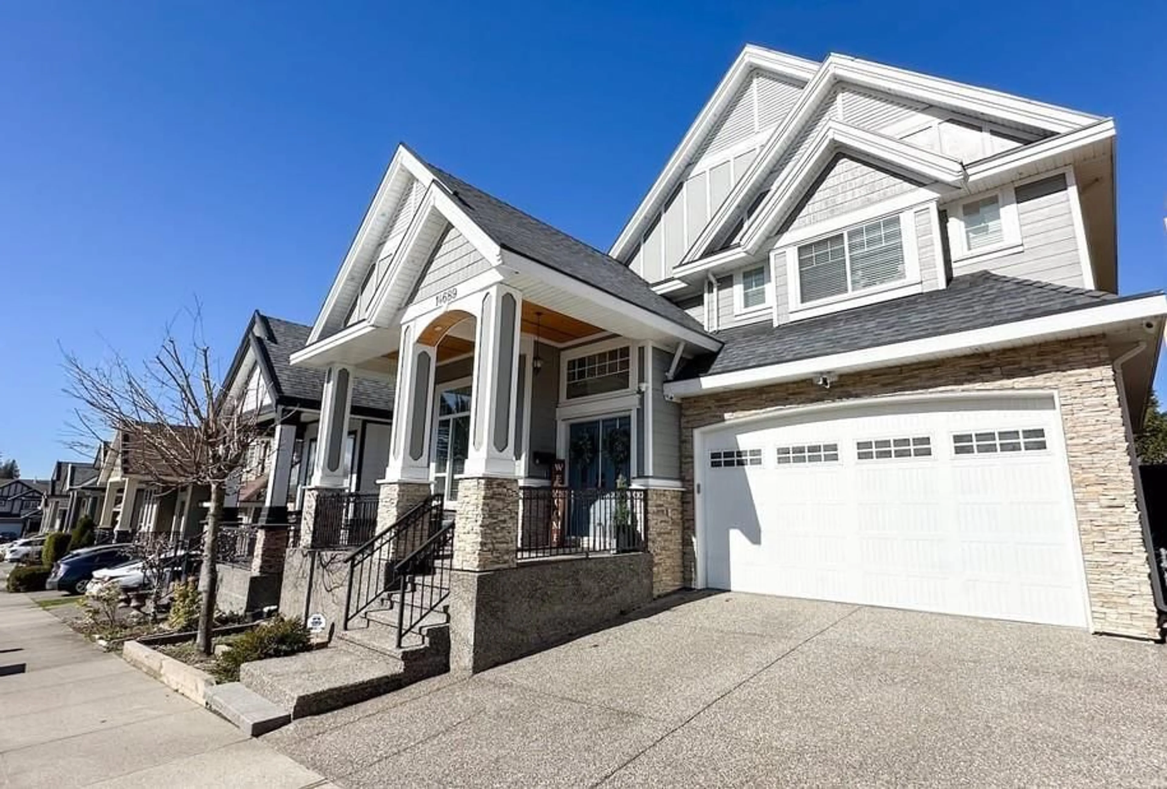 Home with vinyl exterior material, street for 14689 62A AVENUE, Surrey British Columbia V3S3T1