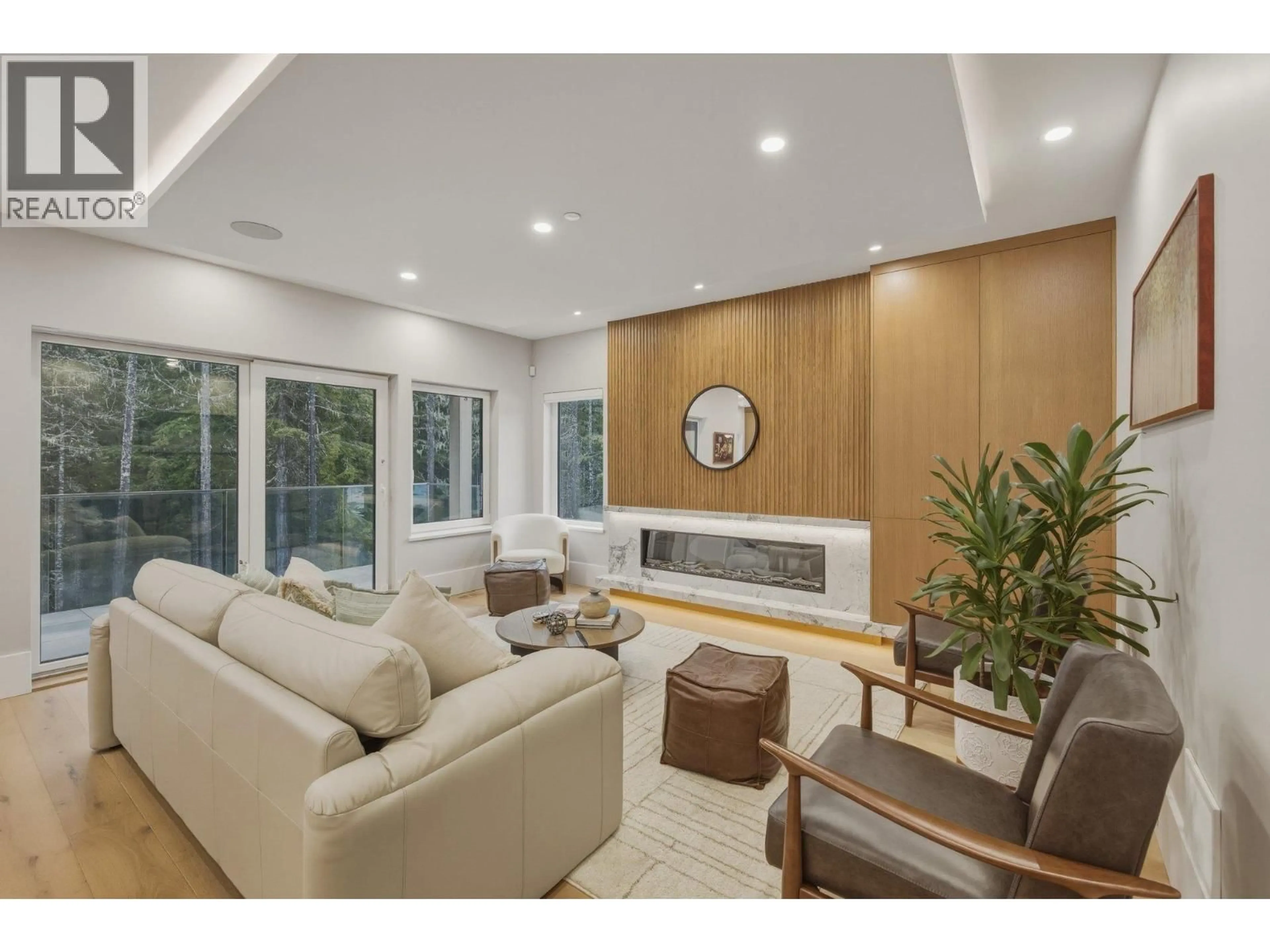 Living room with furniture, wood/laminate floor for 1733 RIVER RUN PLACE, Whistler British Columbia V8E1P4