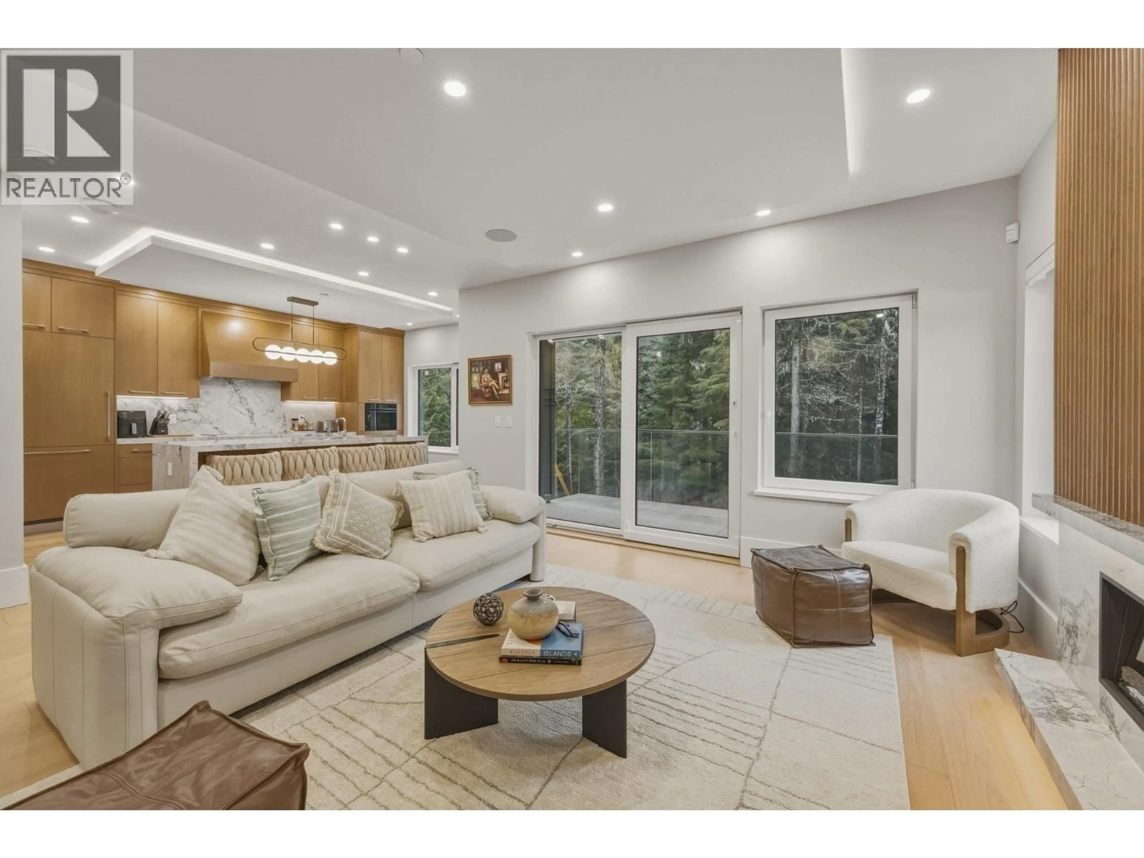 Living room with furniture, wood/laminate floor for 1733 RIVER RUN PLACE, Whistler British Columbia V8E1P4