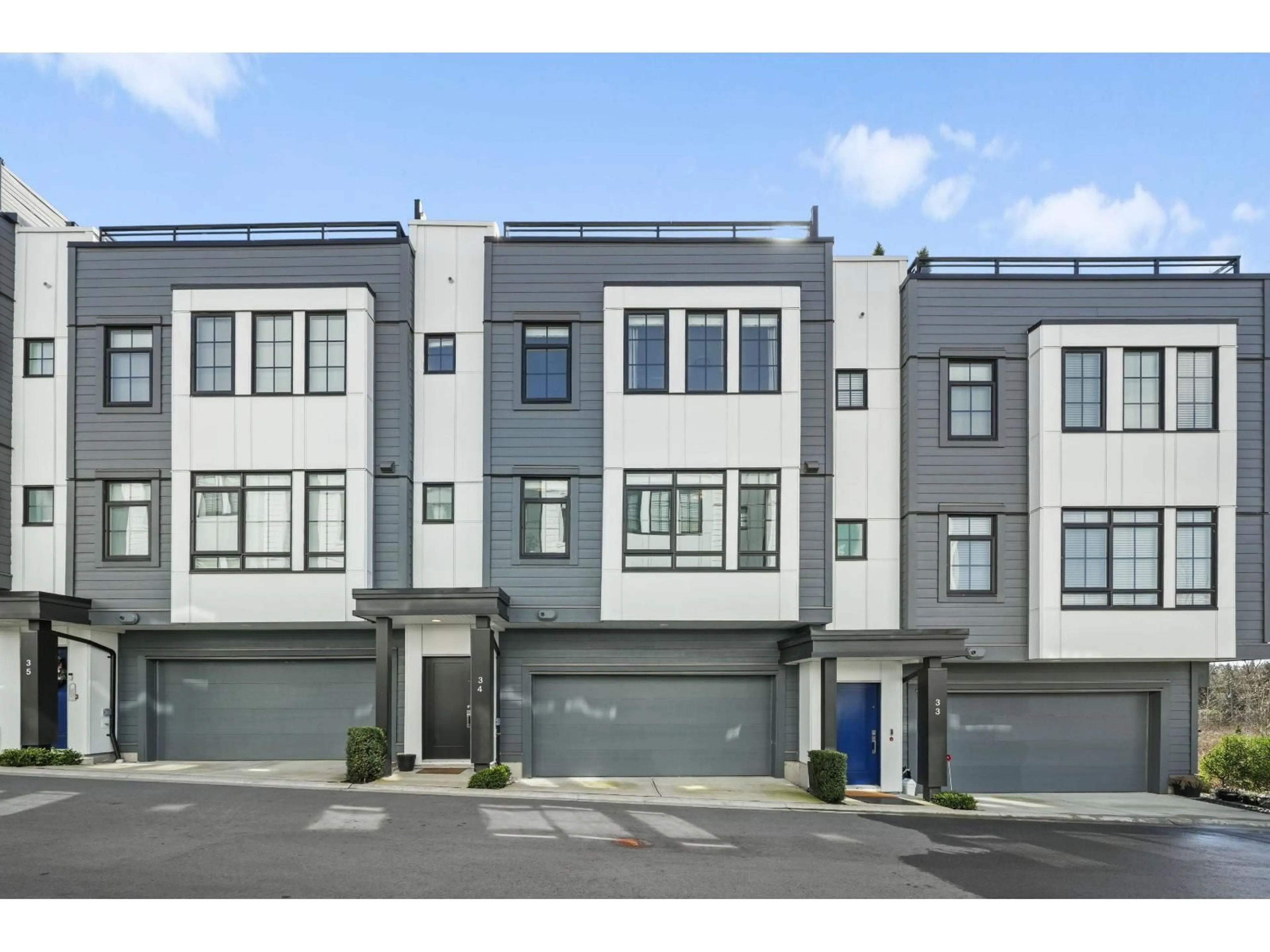 Home with vinyl exterior material, street for 34 - 2075 OAK MEADOWS DRIVE, Surrey British Columbia V3Z1J6