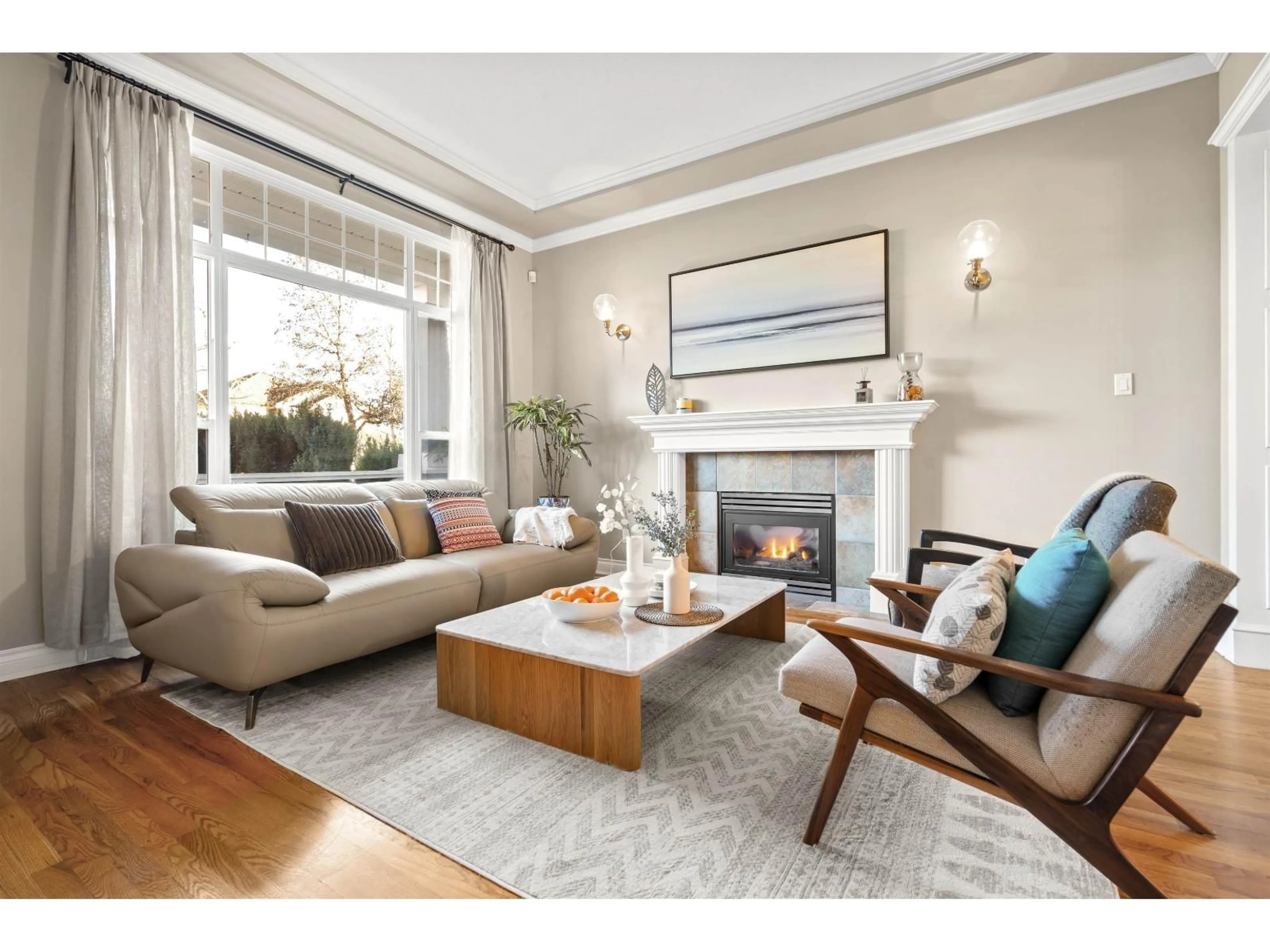 Living room with furniture, wood/laminate floor for 7321 146 STREET, Surrey British Columbia V3S8Z7