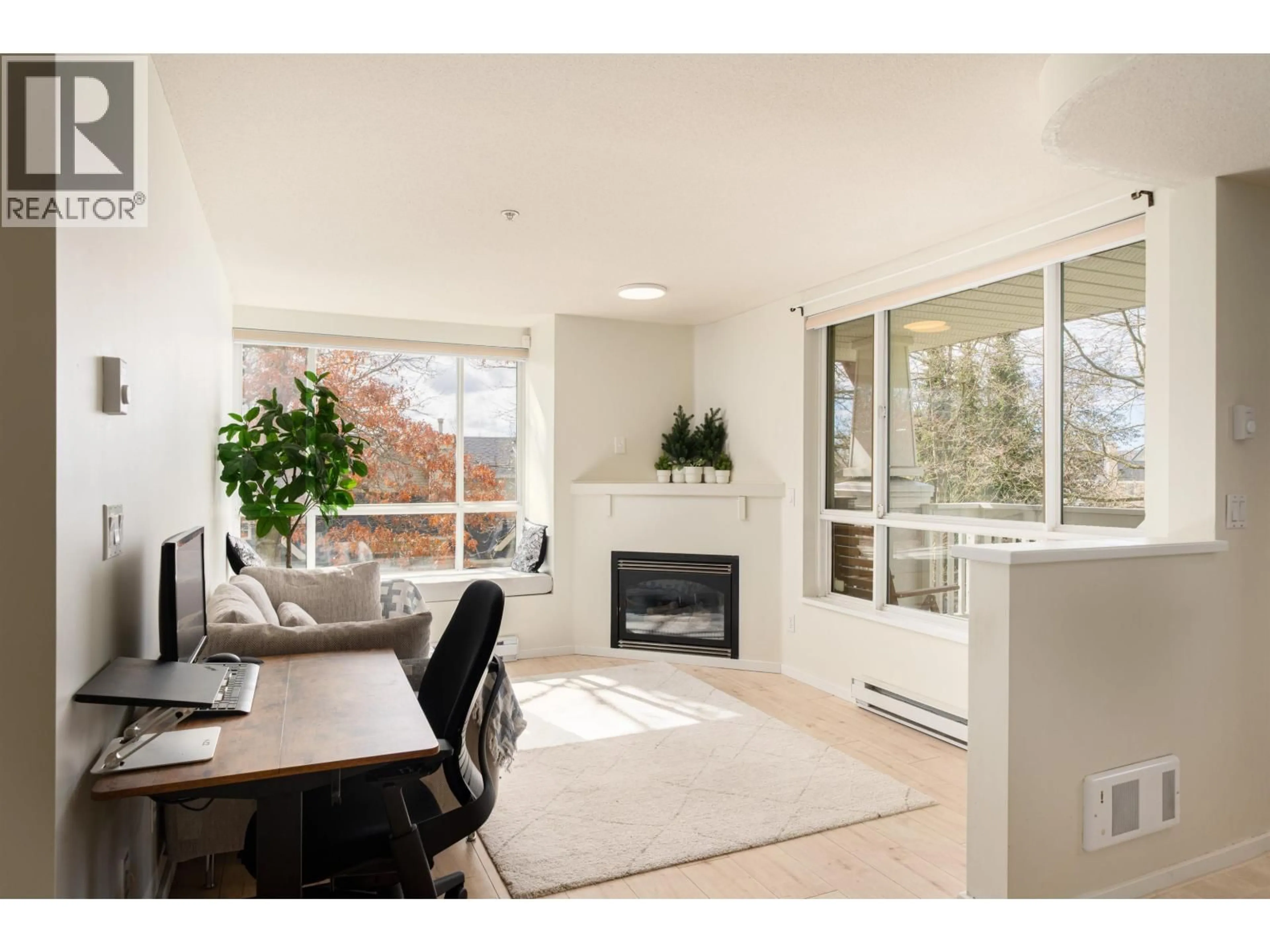 Living room with furniture, unknown for 204 - 6833 VILLAGE, Burnaby British Columbia V5E4M1