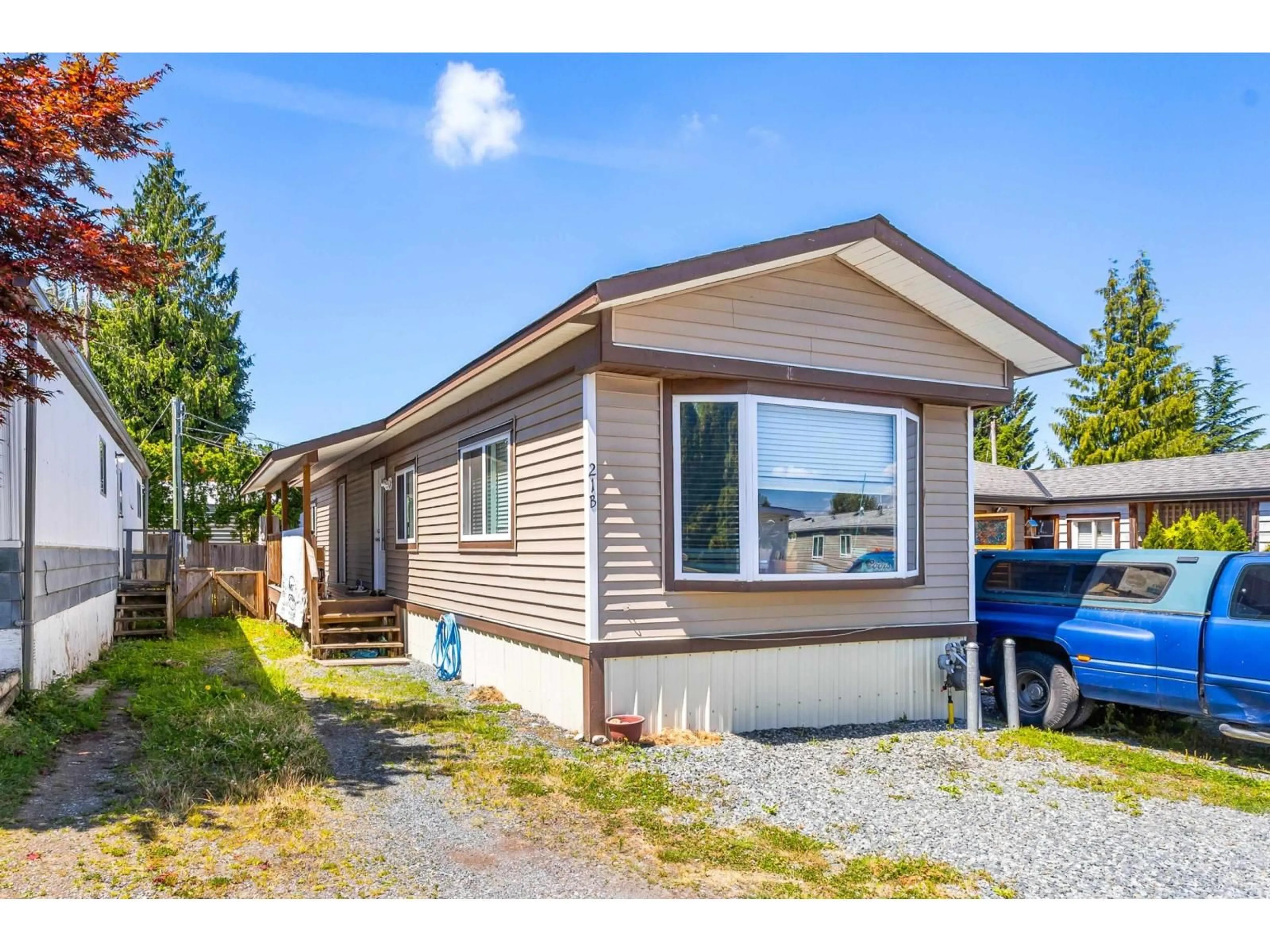 Home with vinyl exterior material, street for 21B - 26892 FRASER HIGHWAY, Langley British Columbia V4W3V3