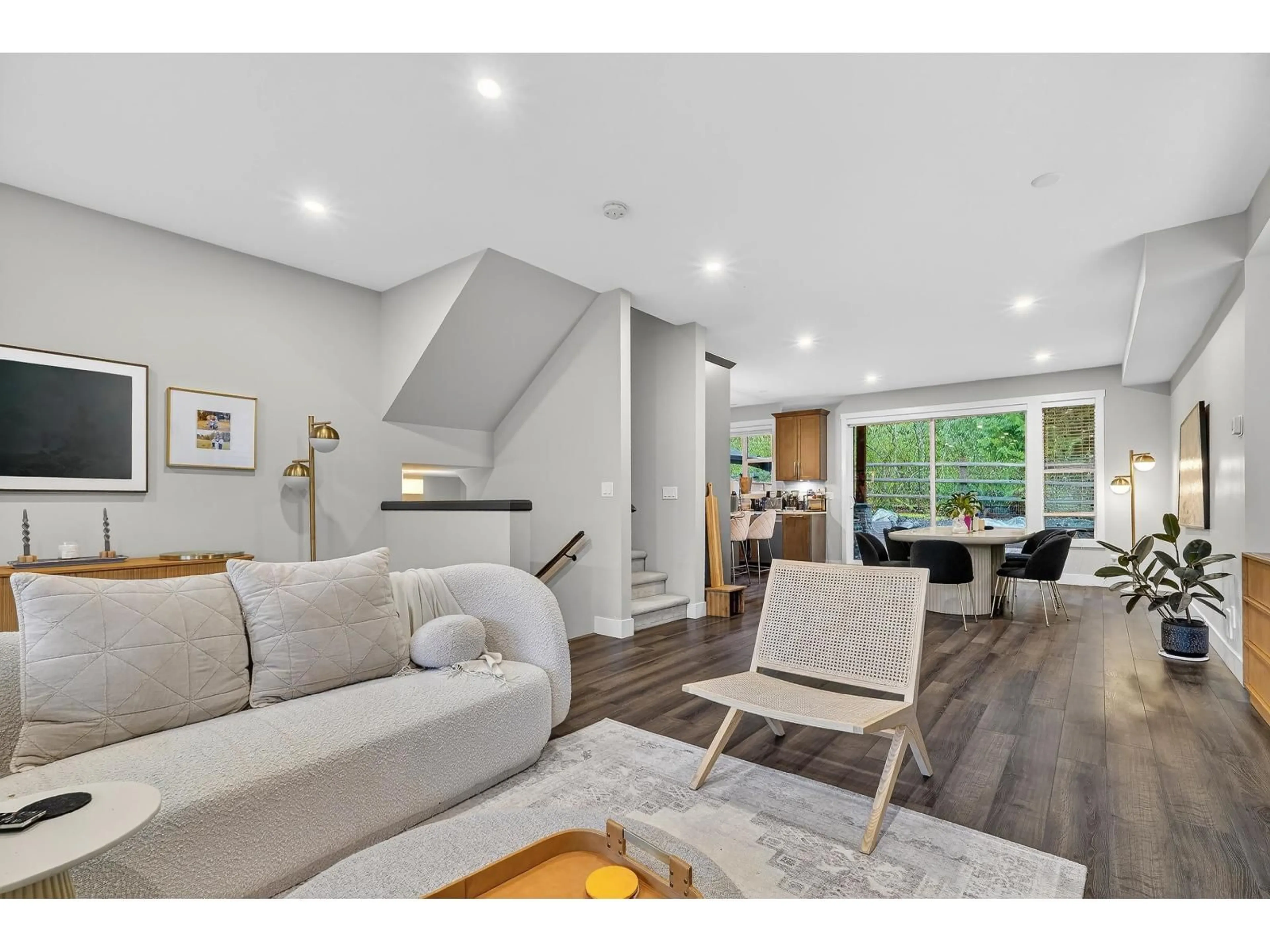 Living room with furniture, wood/laminate floor for 22 - 3618 150 STREET, Surrey British Columbia V3Z0W3