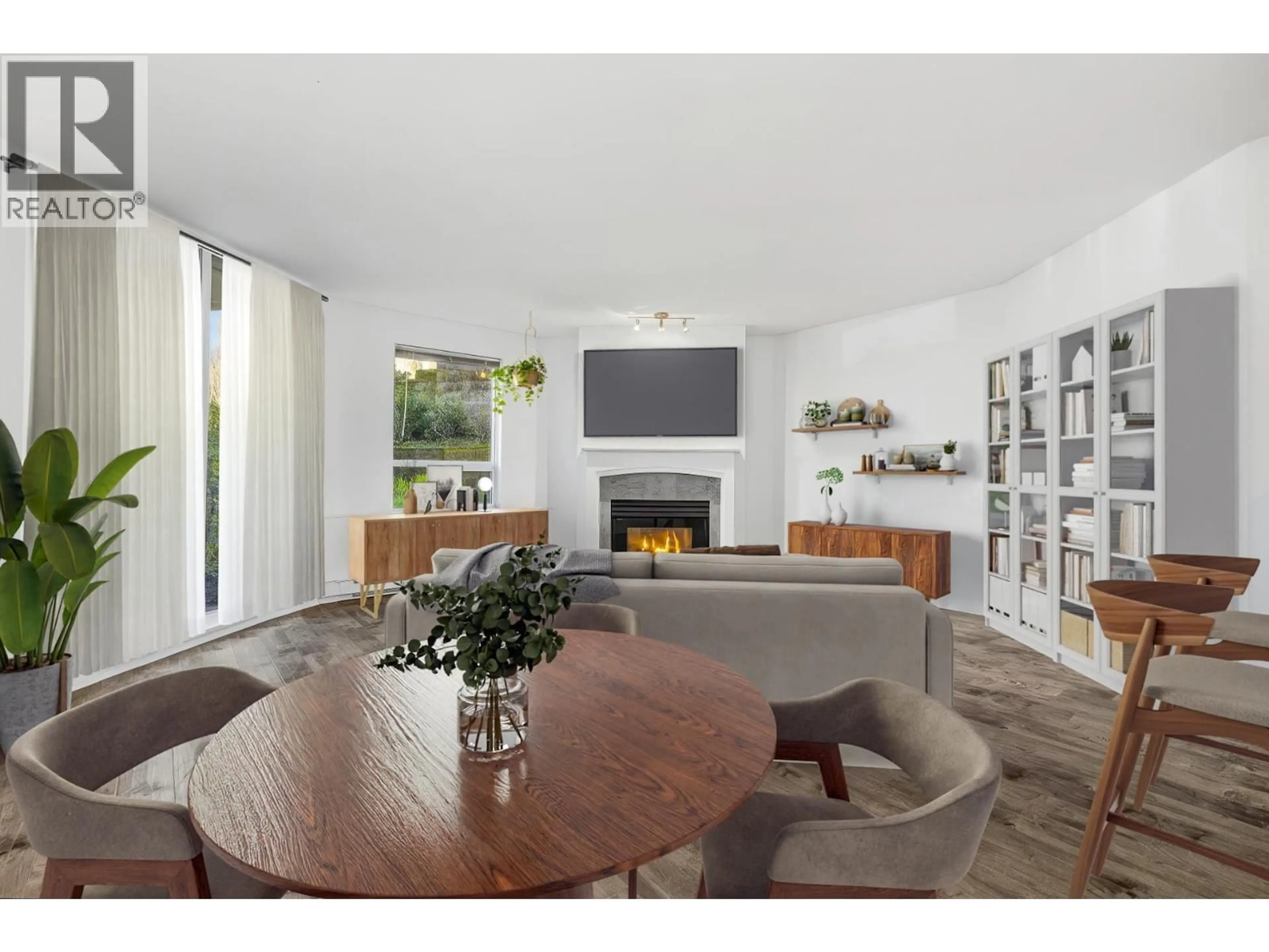 Living room with furniture, unknown for 101 - 8460 JELLICOE STREET, Vancouver British Columbia V5S4S8