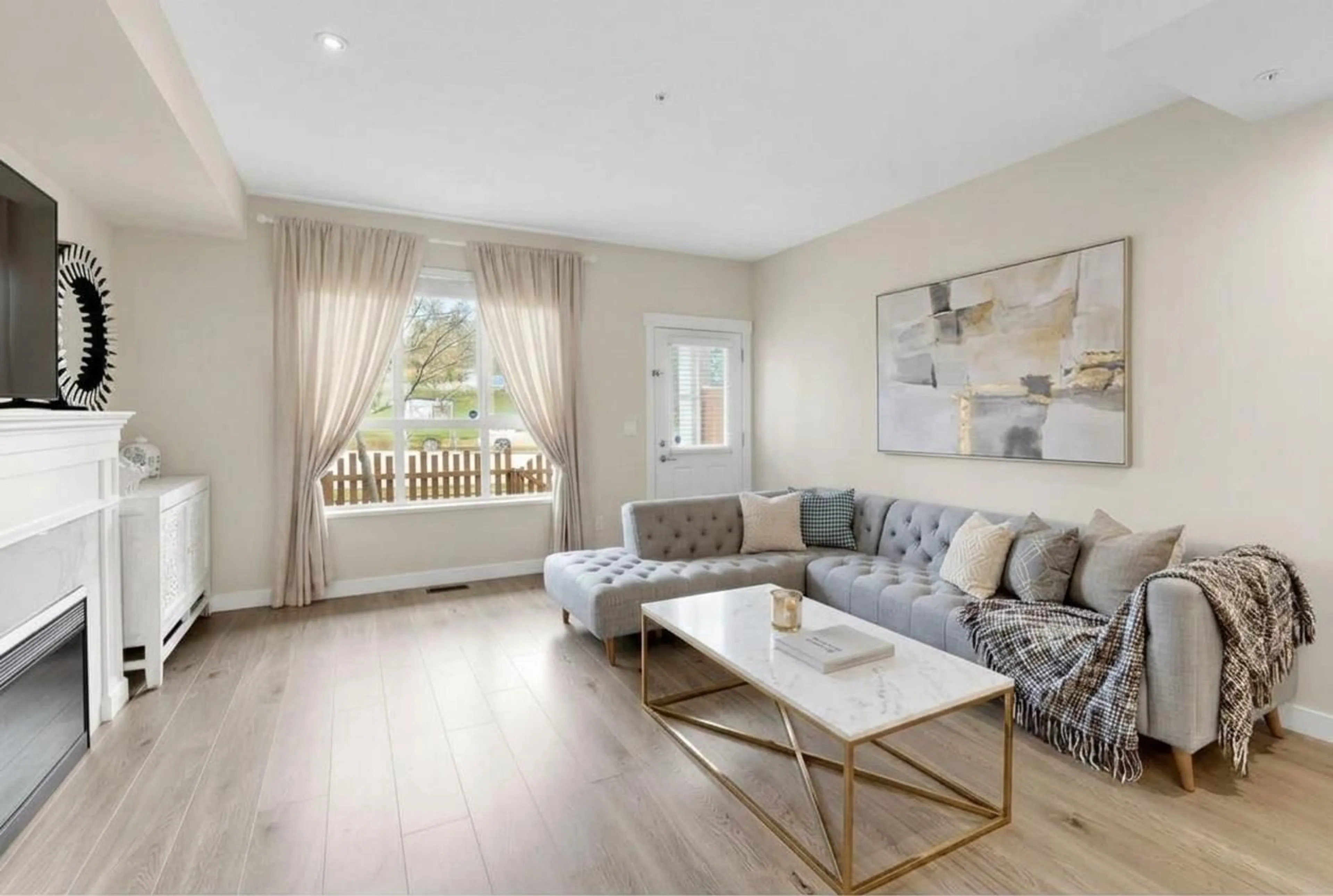 Living room with furniture, wood/laminate floor for 52 - 7157 210 STREET, Langley British Columbia V2Y0T3