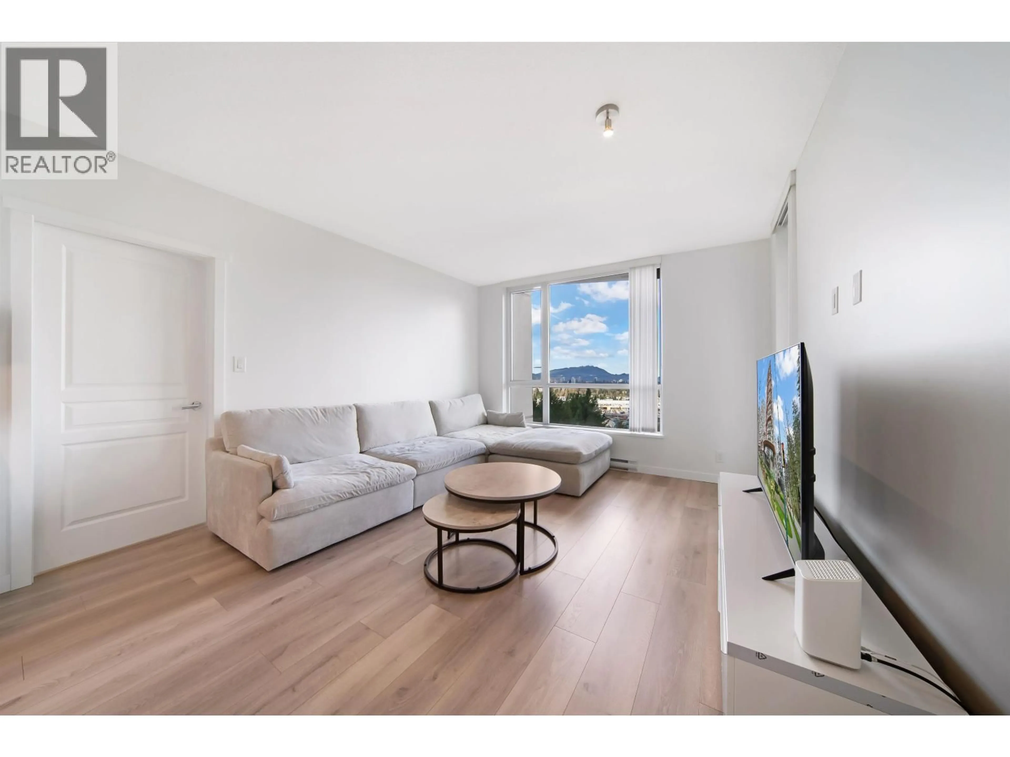 Living room with furniture, wood/laminate floor for 2205 - 3096 WINDSOR GATE, Coquitlam British Columbia V3B0P4