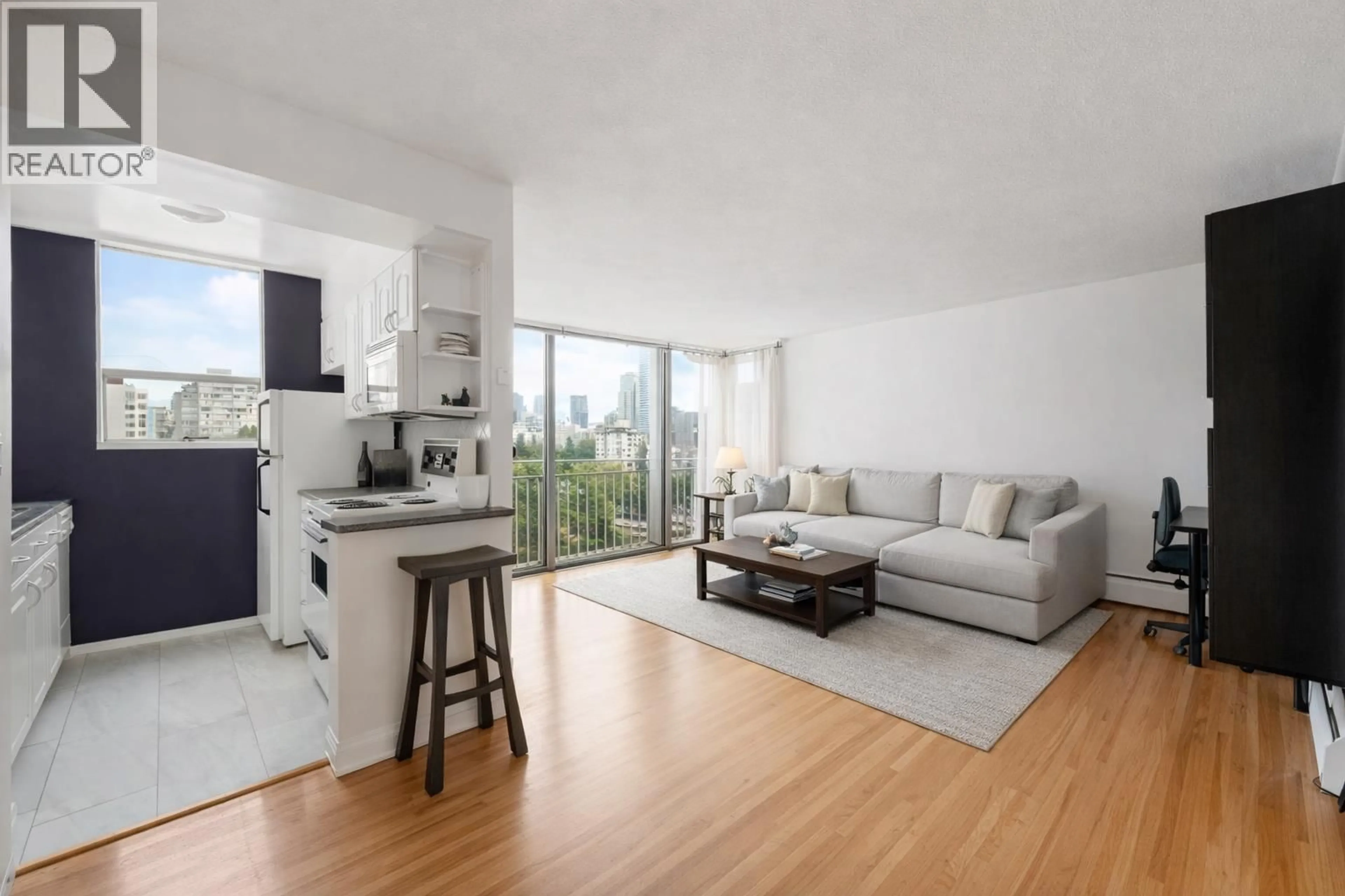 Living room with furniture, wood/laminate floor for 906 - 1250 BURNABY STREET, Vancouver British Columbia V6E1P5