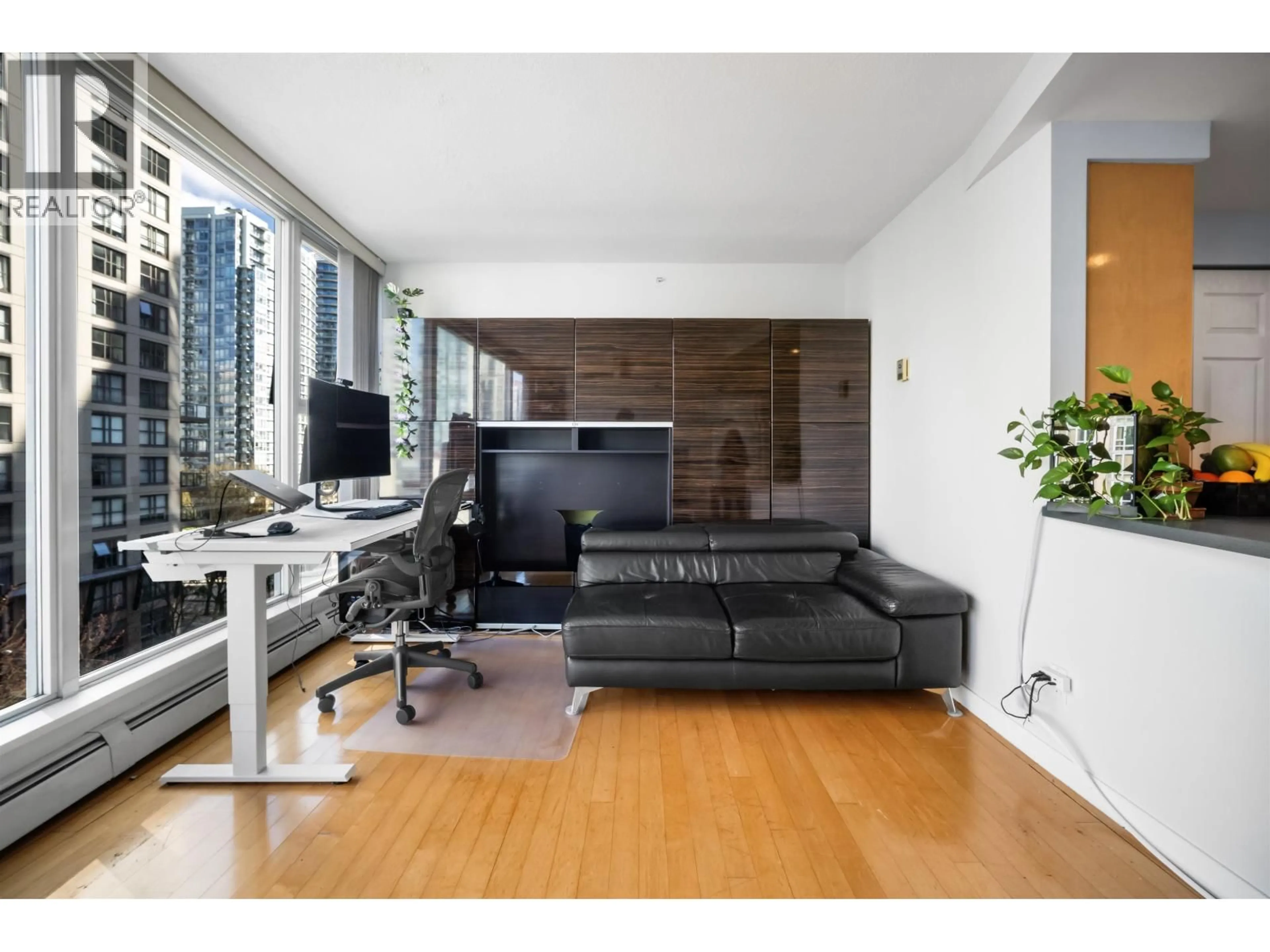 Living room with furniture, wood/laminate floor for 702 - 1008 CAMBIE STREET, Vancouver British Columbia V6B6J7