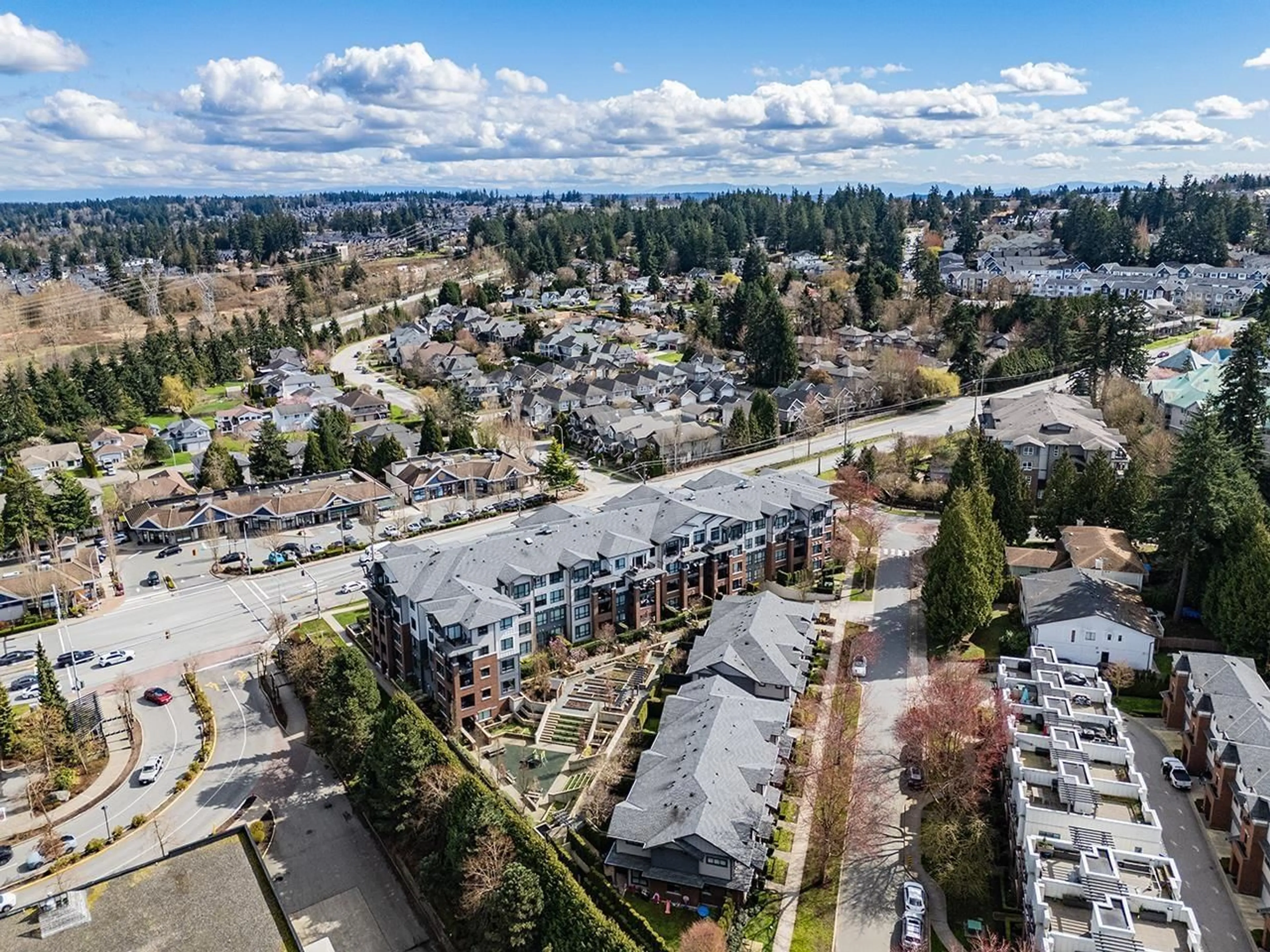 A pic from outside/outdoor area/front of a property/back of a property/a pic from drone, mountain view for 205 - 2960 151 STREET, Surrey British Columbia V4P0G3