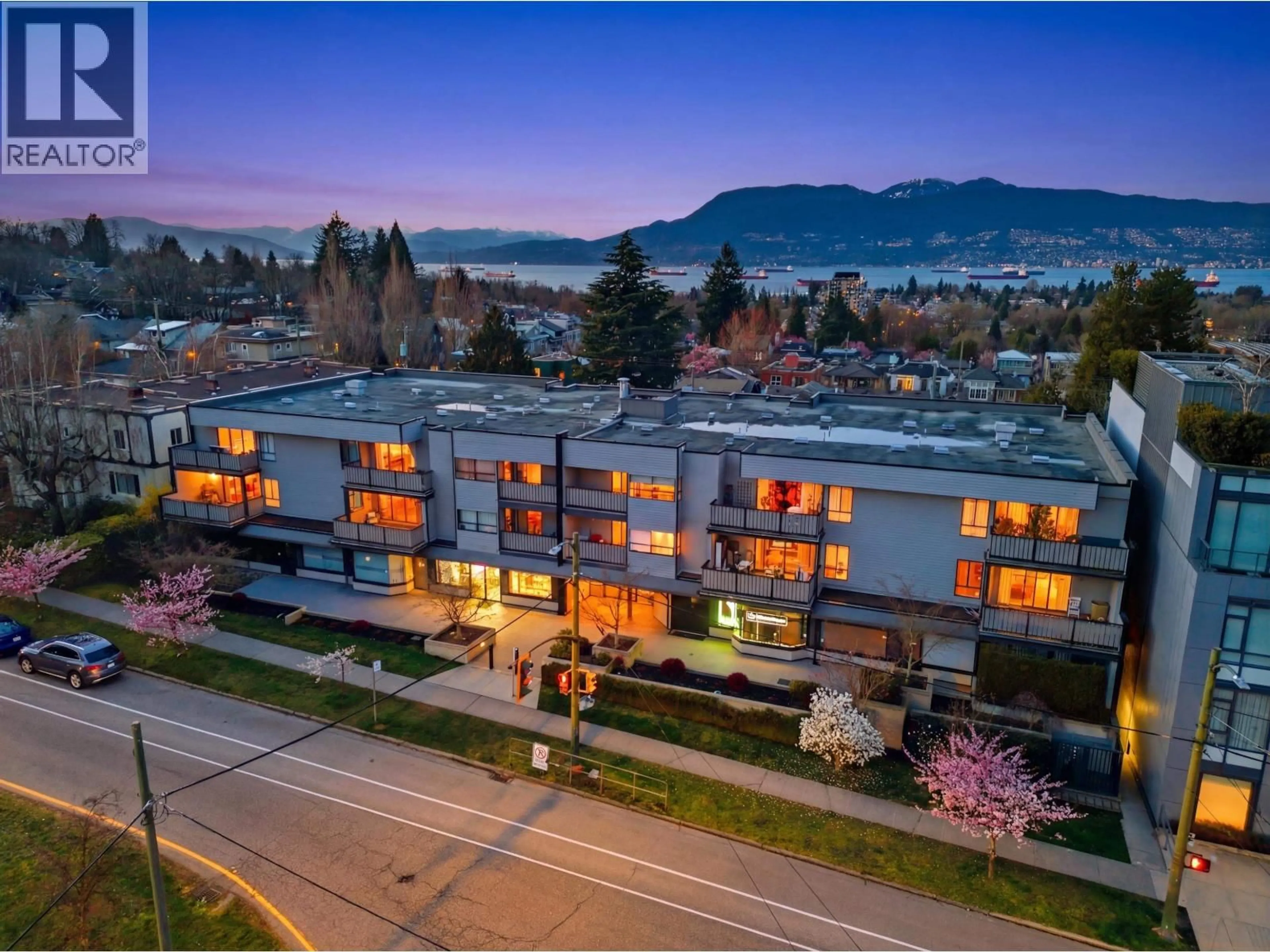 A pic from outside/outdoor area/front of a property/back of a property/a pic from drone, mountain view for 207 - 3663 16 AVENUE, Vancouver British Columbia V6R3C3