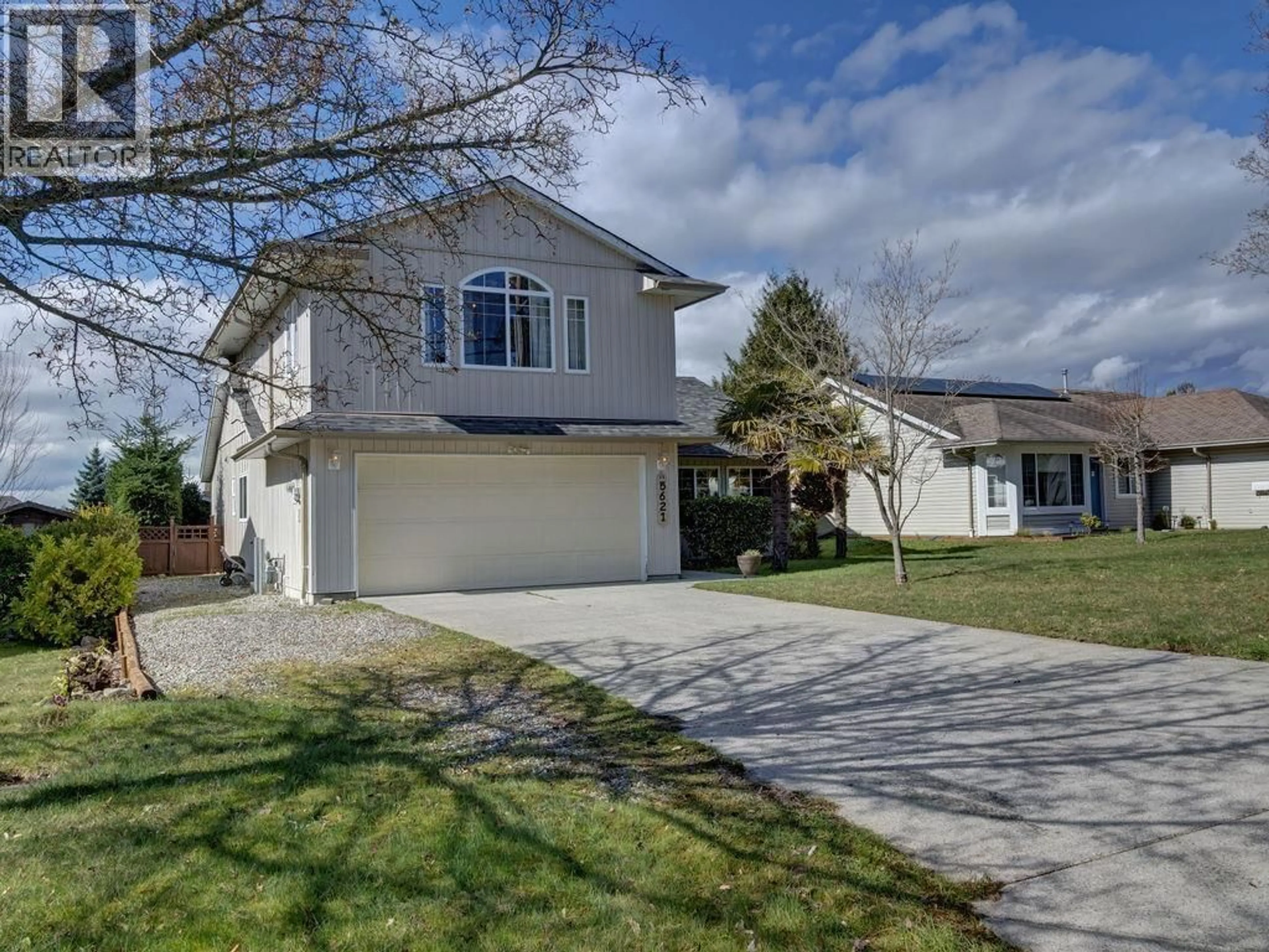 Home with vinyl exterior material, street for 5621 NICKERSON ROAD, Sechelt British Columbia V7Z0M6