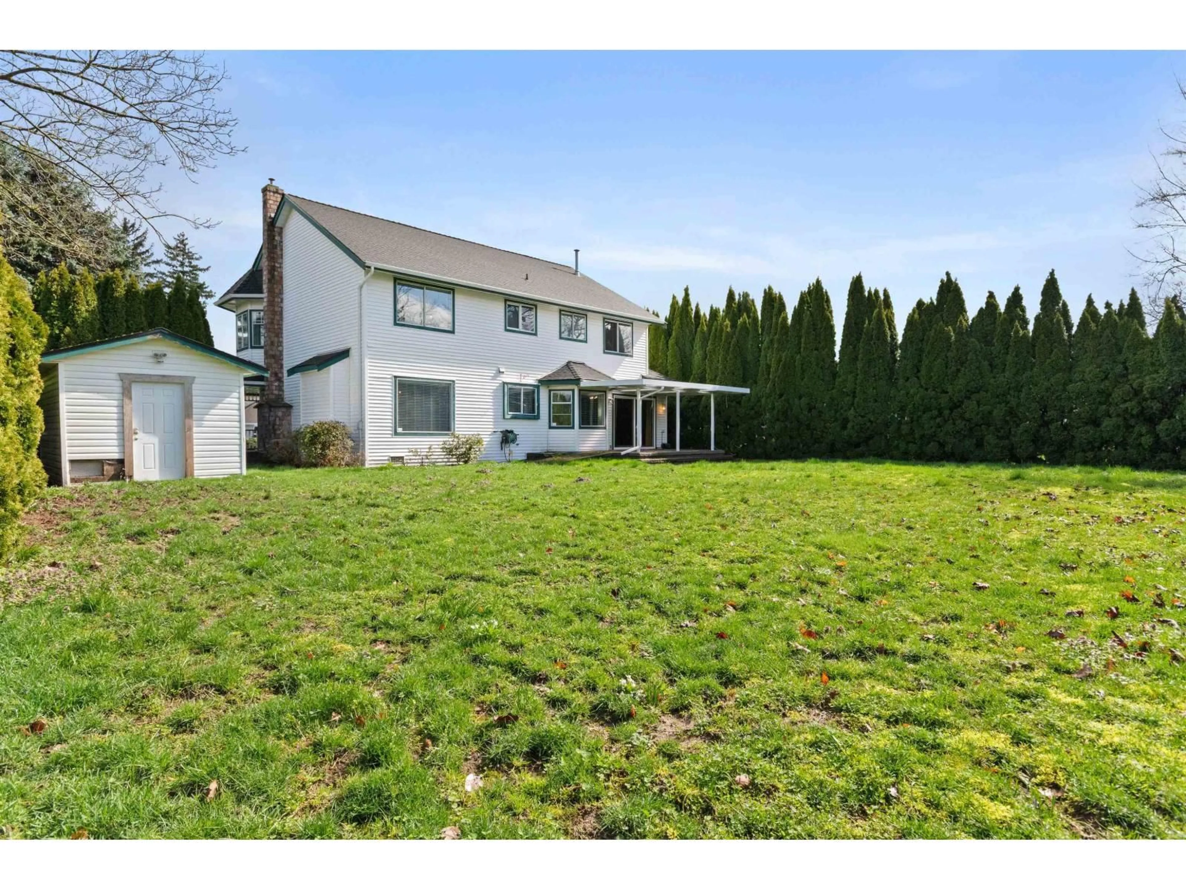 A pic from outside/outdoor area/front of a property/back of a property/a pic from drone, street for 46378 CHRISTINA DRIVE, Chilliwack British Columbia V2R2B5