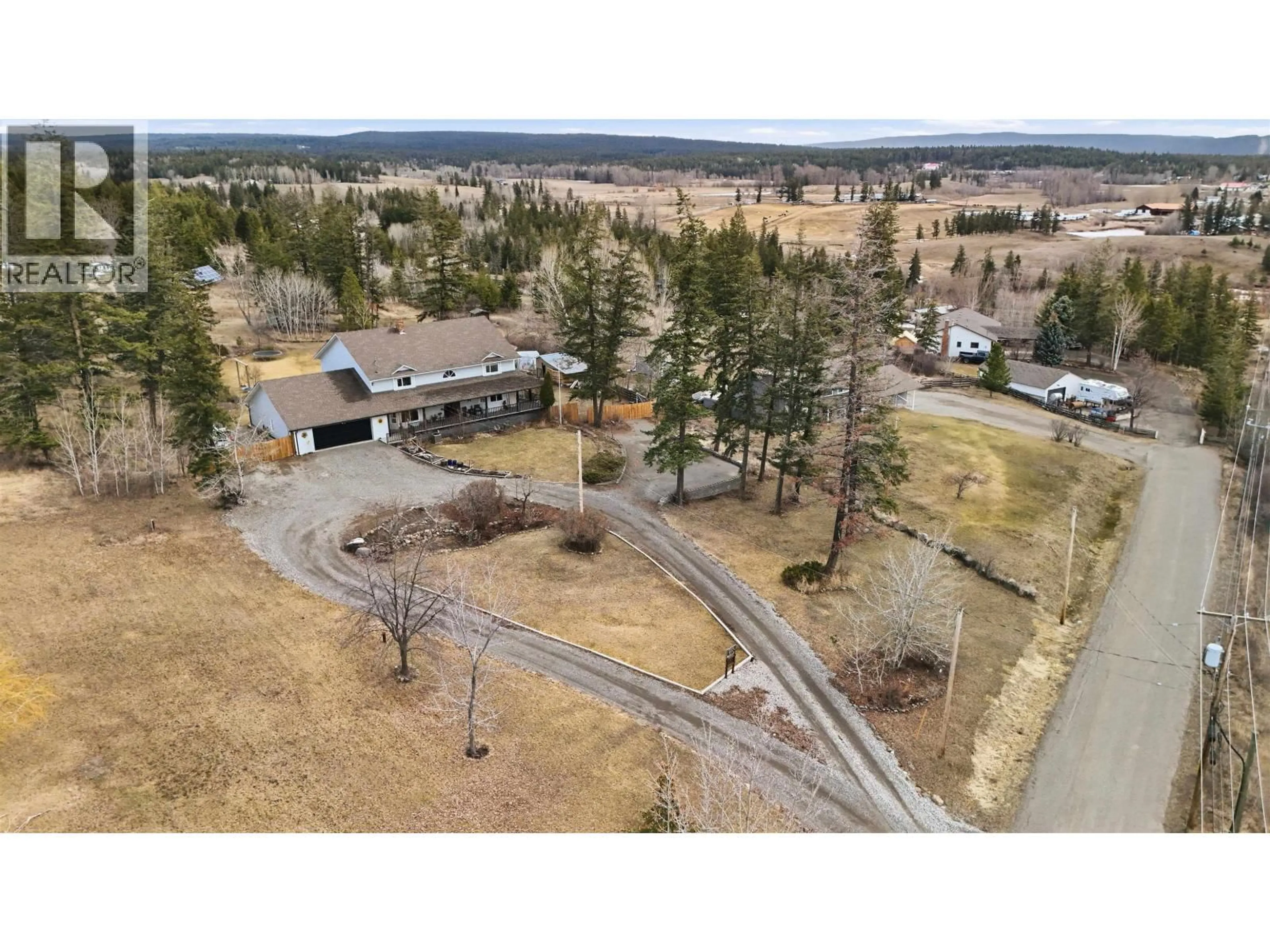 A pic from outside/outdoor area/front of a property/back of a property/a pic from drone, mountain view for 48 VALLEYVIEW ROAD, 150 Mile House British Columbia V0K2G0