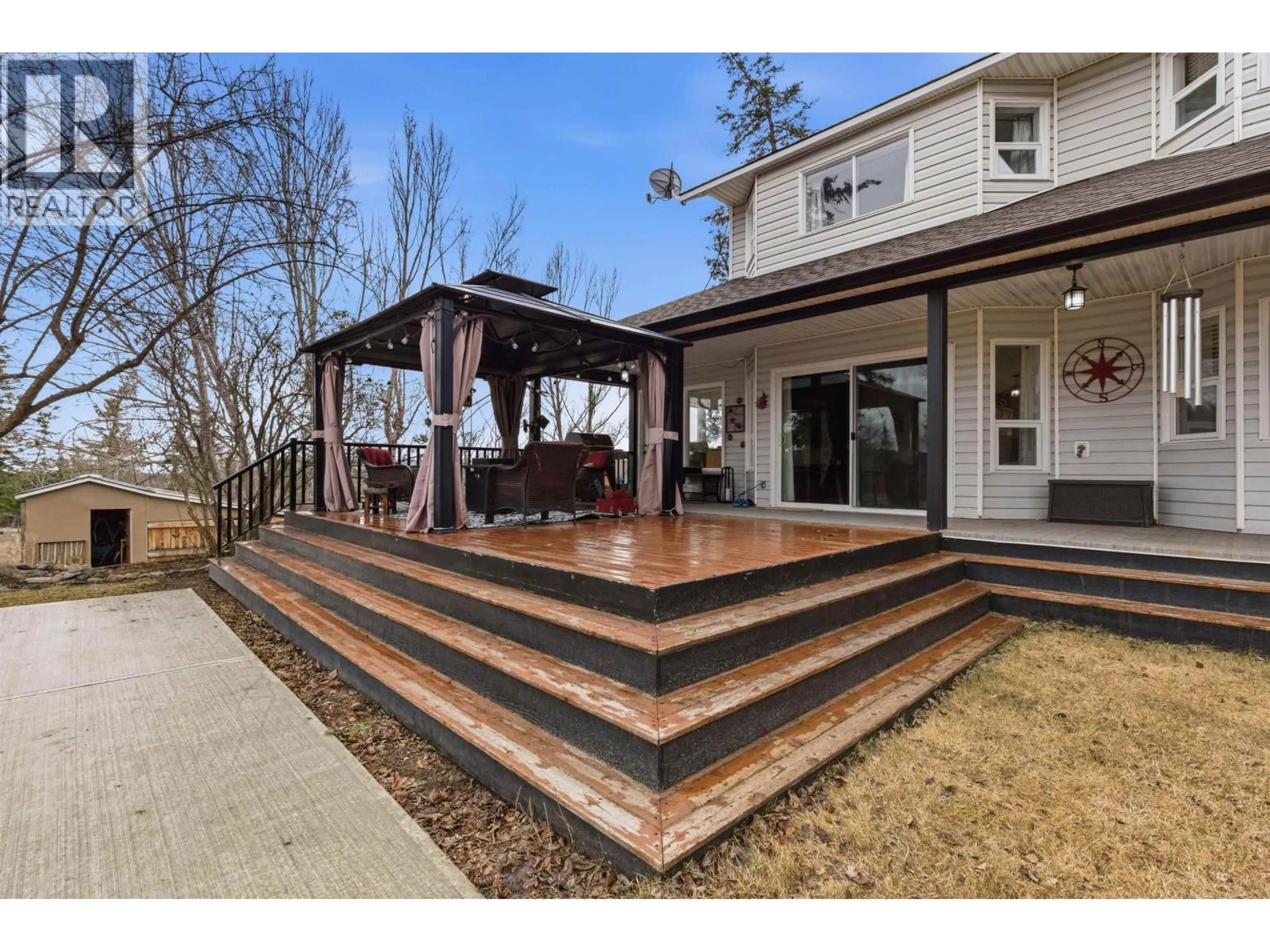 Patio, street for 48 VALLEYVIEW ROAD, 150 Mile House British Columbia V0K2G0