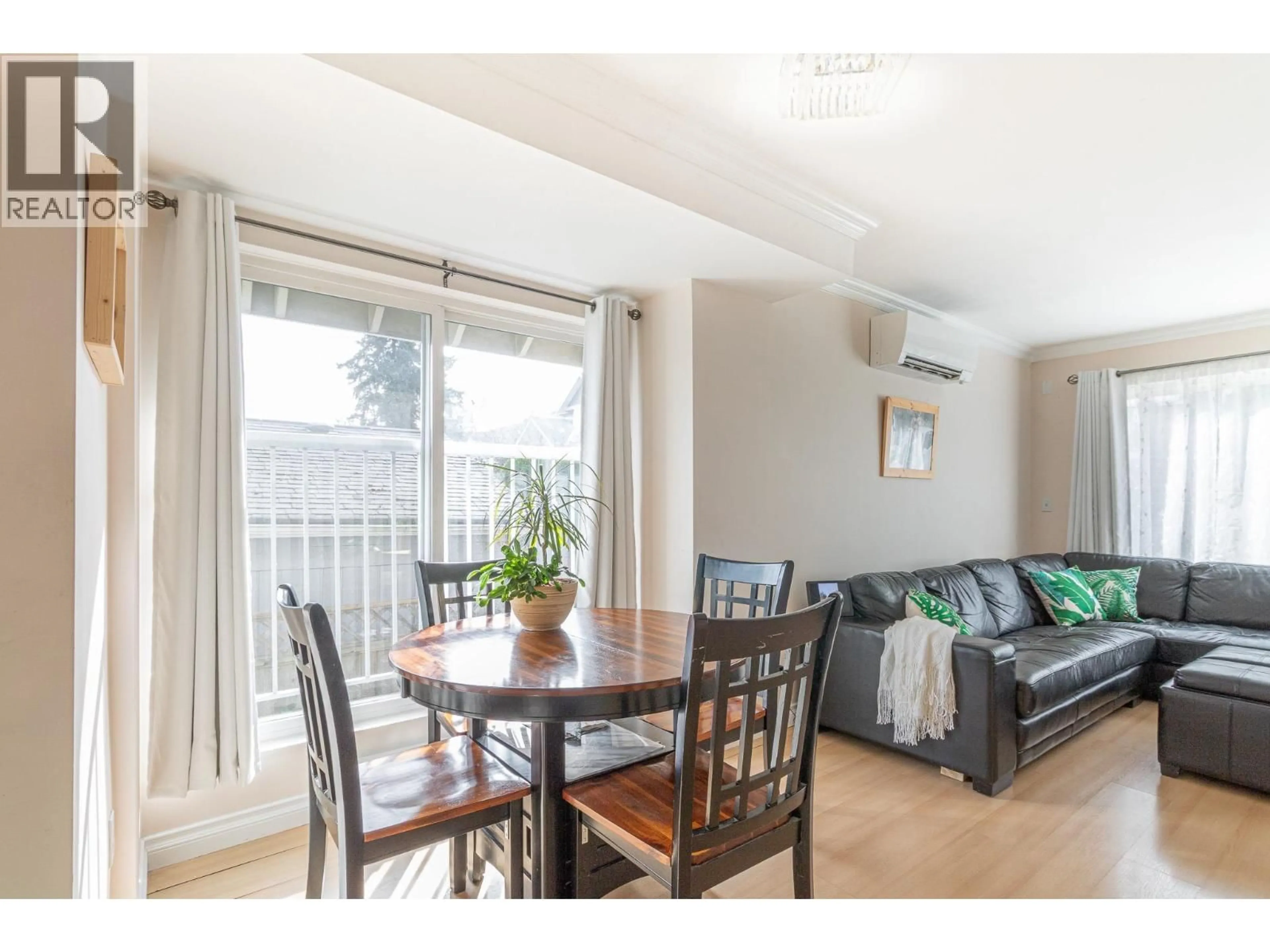 Dining room, wood/laminate floor for 107 - 1570 PRAIRIE AVENUE, Port Coquitlam British Columbia V3B1T4