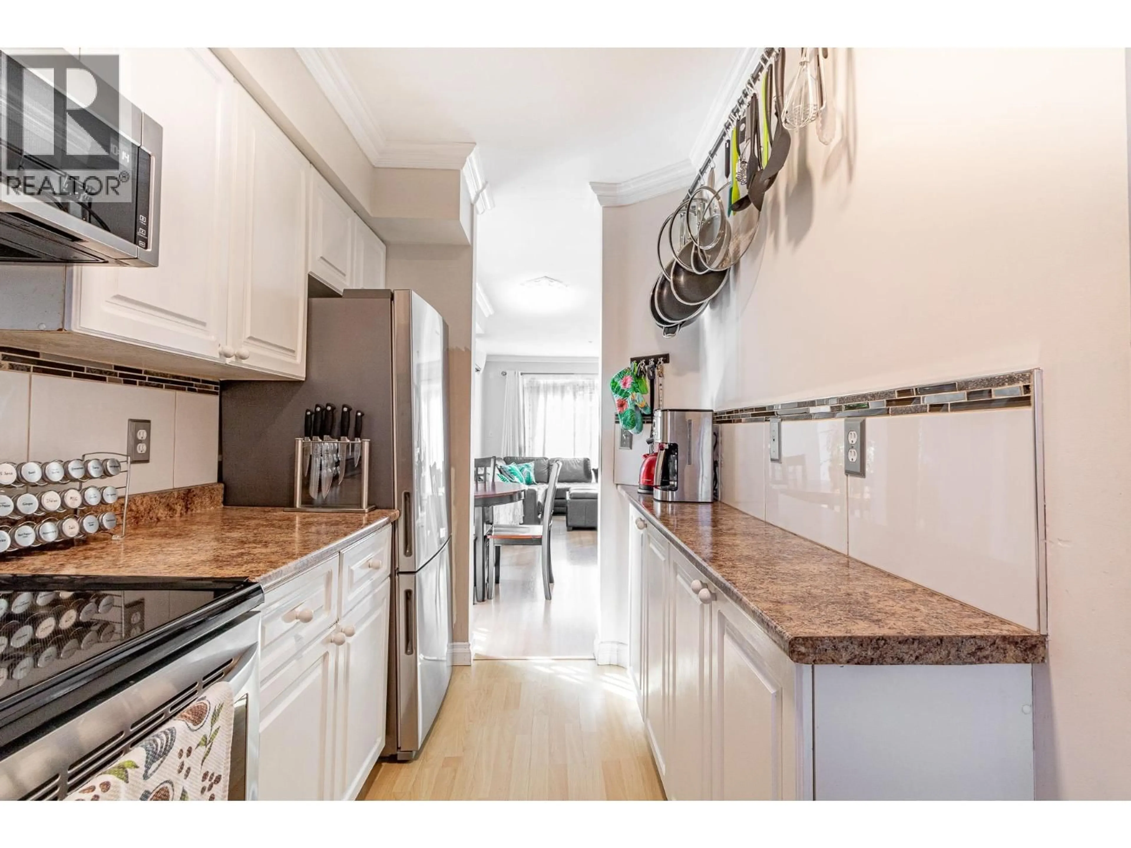 Open concept kitchen, unknown for 107 - 1570 PRAIRIE AVENUE, Port Coquitlam British Columbia V3B1T4