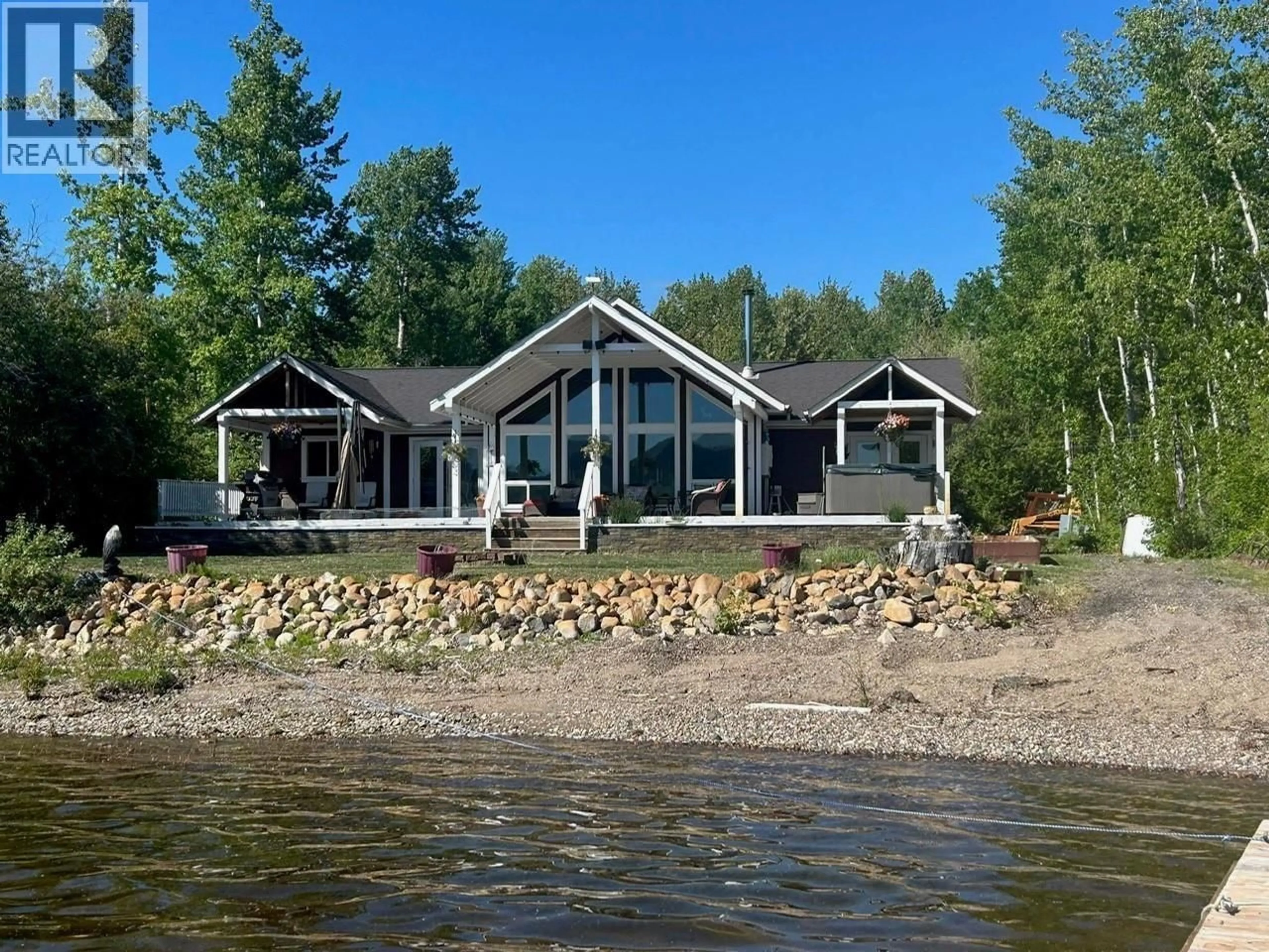 A pic from outside/outdoor area/front of a property/back of a property/a pic from drone, water/lake/river/ocean view for 7285 PETERSON ROAD, Fraser Lake British Columbia V0J1S0