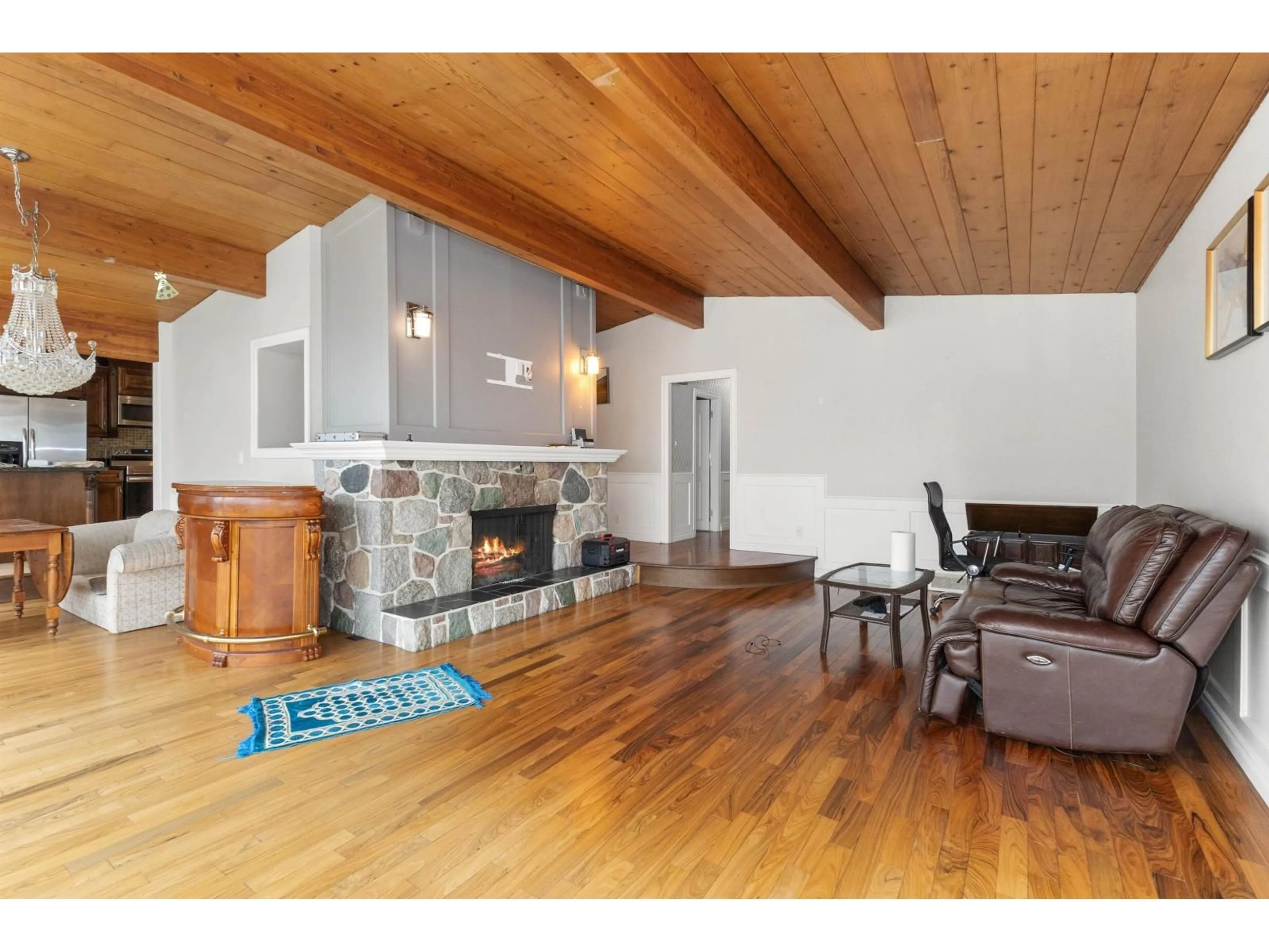 Living room with furniture, wood/laminate floor for 11875 99A AVENUE, Surrey British Columbia V3V2P9