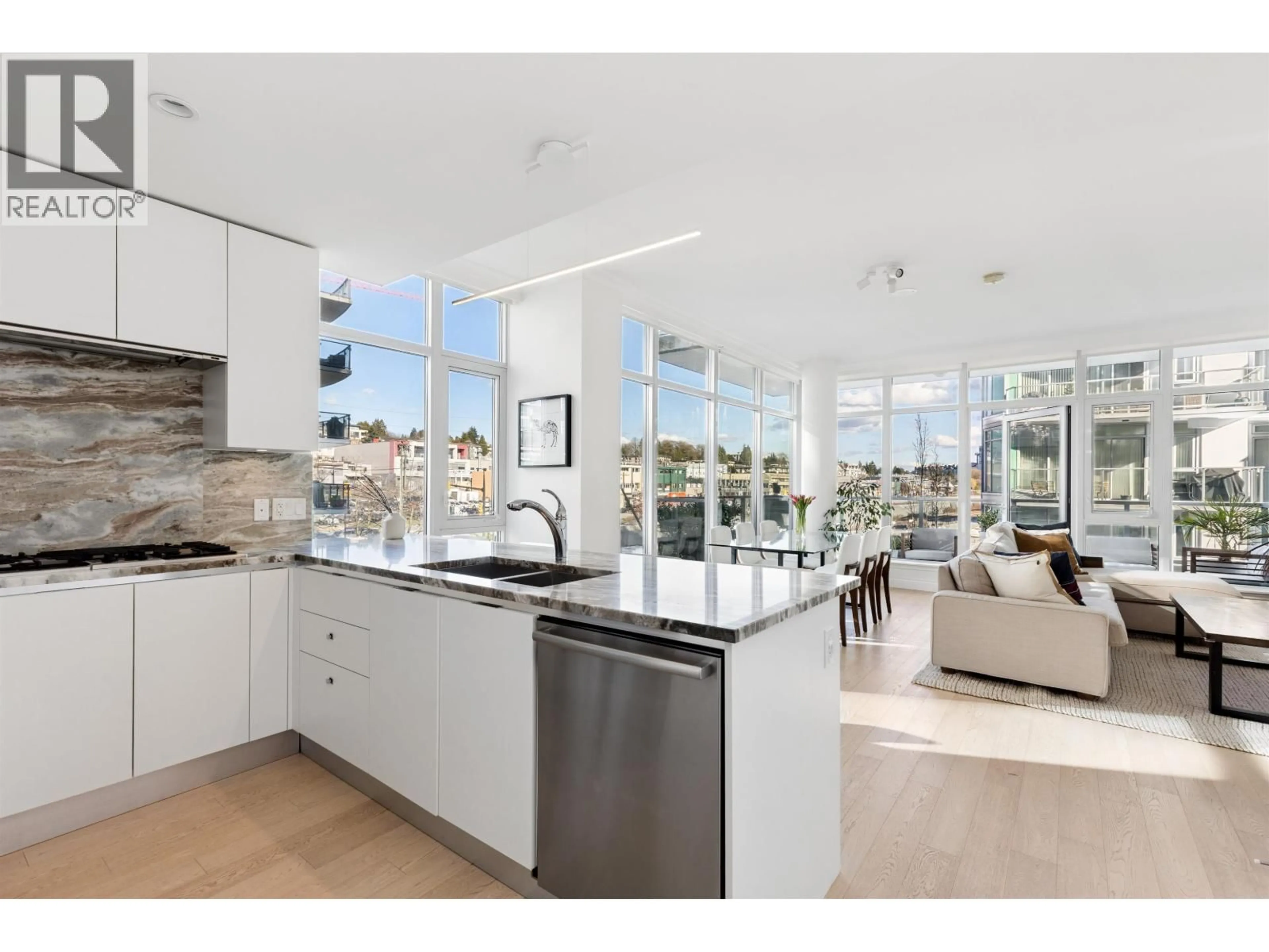 Open concept kitchen, ceramic/tile floor for 409 - 185 VICTORY SHIP WAY, North Vancouver British Columbia V7L0G2