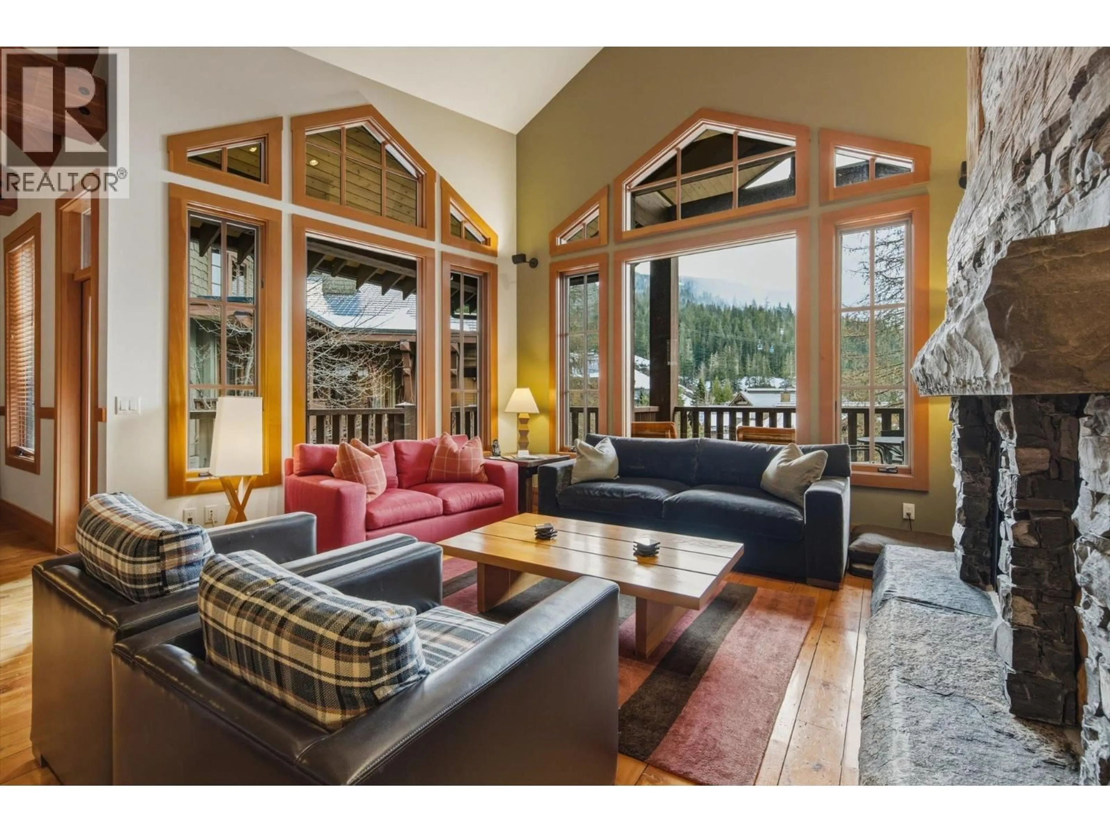 Living room with furniture, wood/laminate floor for 17H - 2300 NORDIC DRIVE, Whistler British Columbia V8E0A6