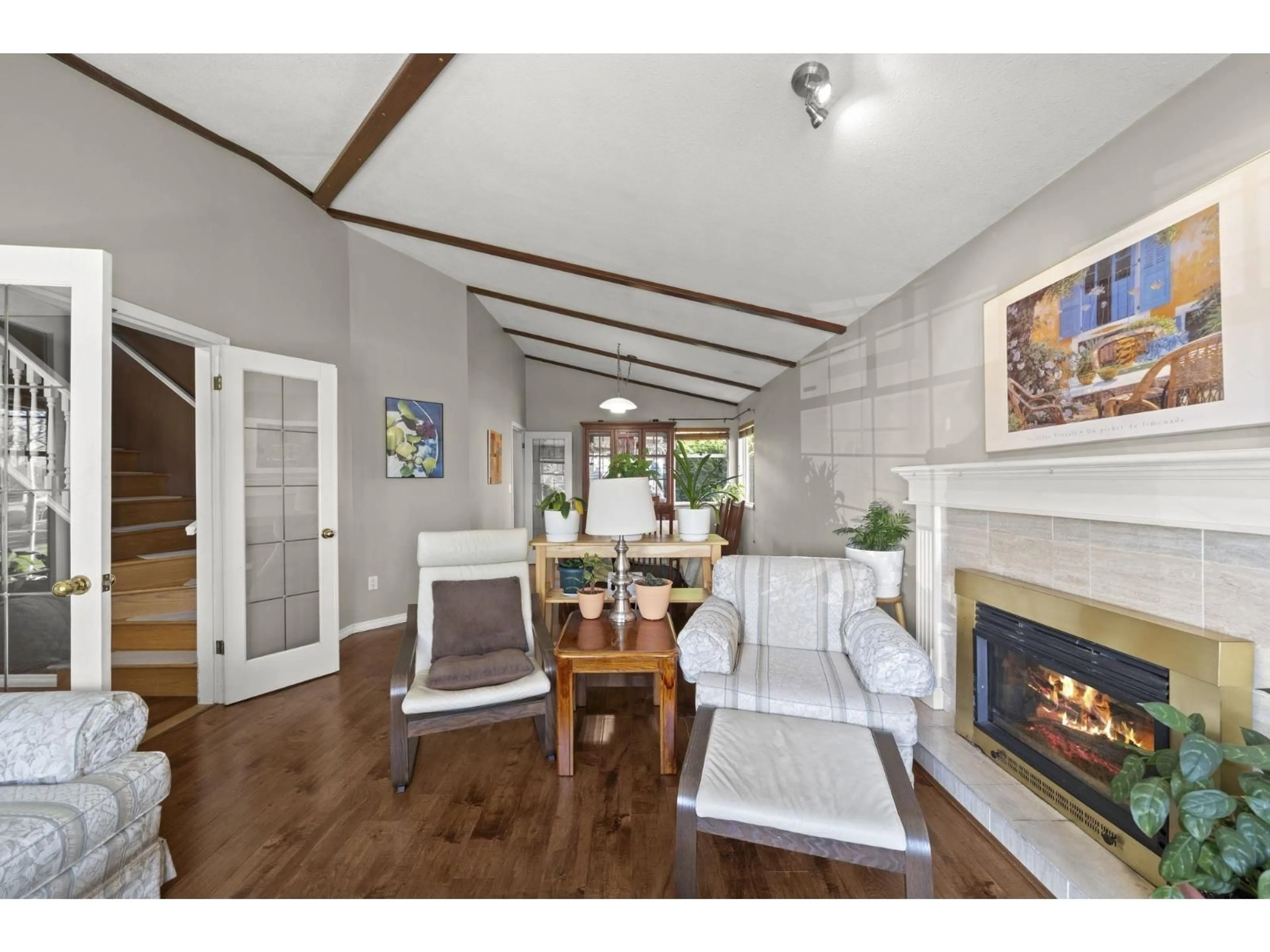 Living room with furniture, wood/laminate floor for 8891 157 STREET, Surrey British Columbia V4N2Y8