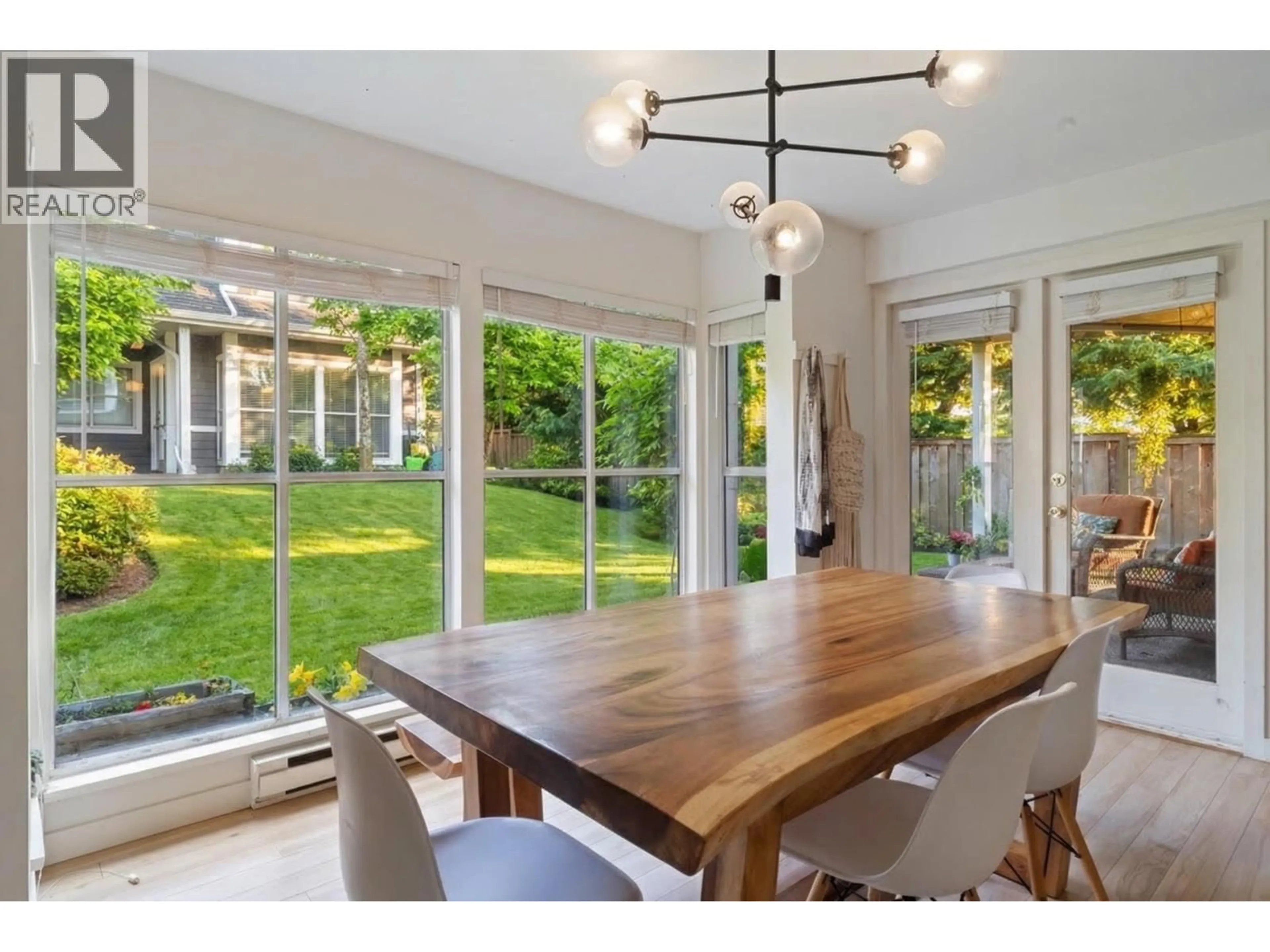 Dining room, wood/laminate floor for 118 - 2960 29TH AVENUE, Vancouver British Columbia V5R5Z5