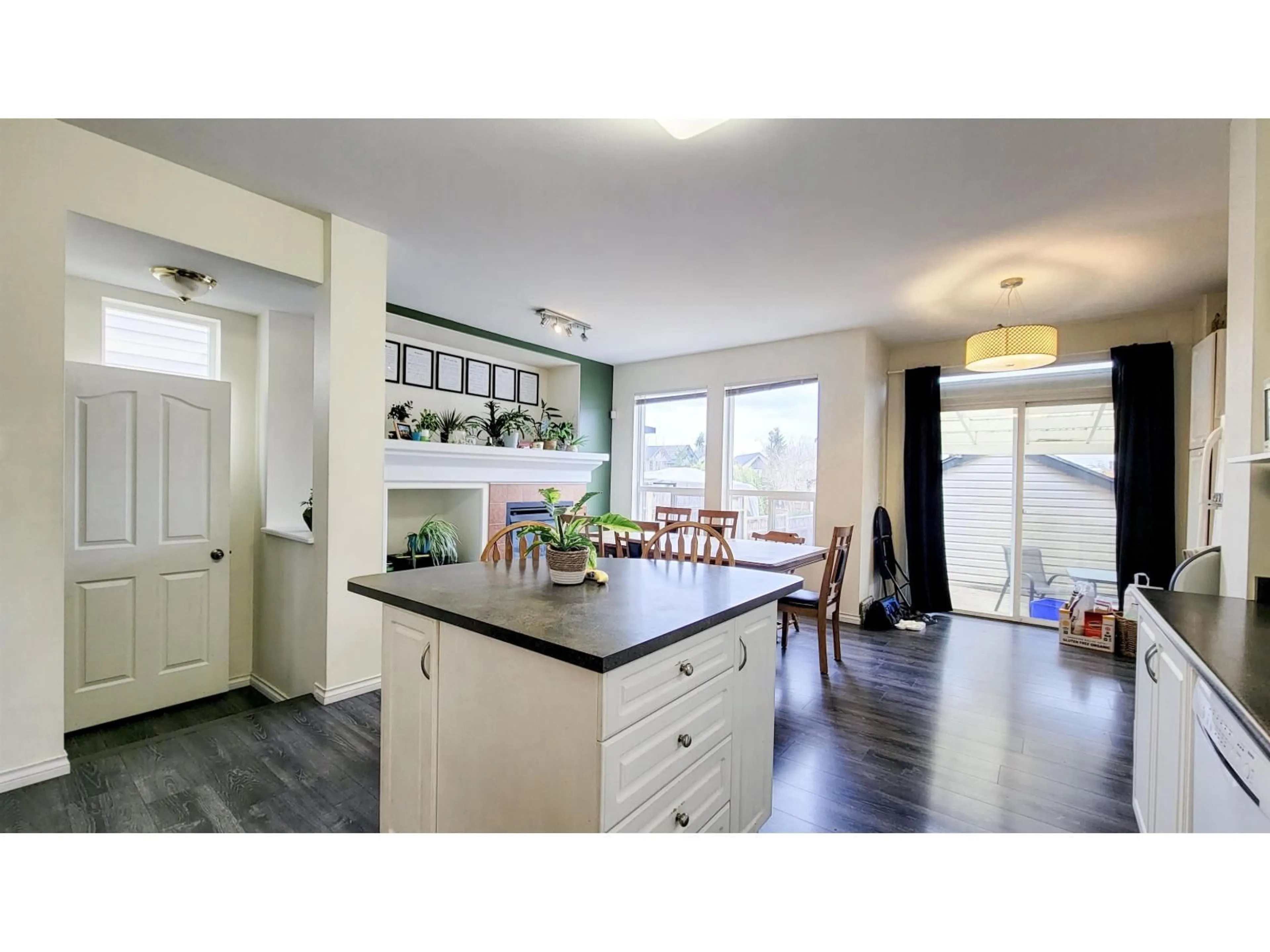 Open concept kitchen, wood/laminate floor for 18455 67 AVENUE, Surrey British Columbia V3S9A8
