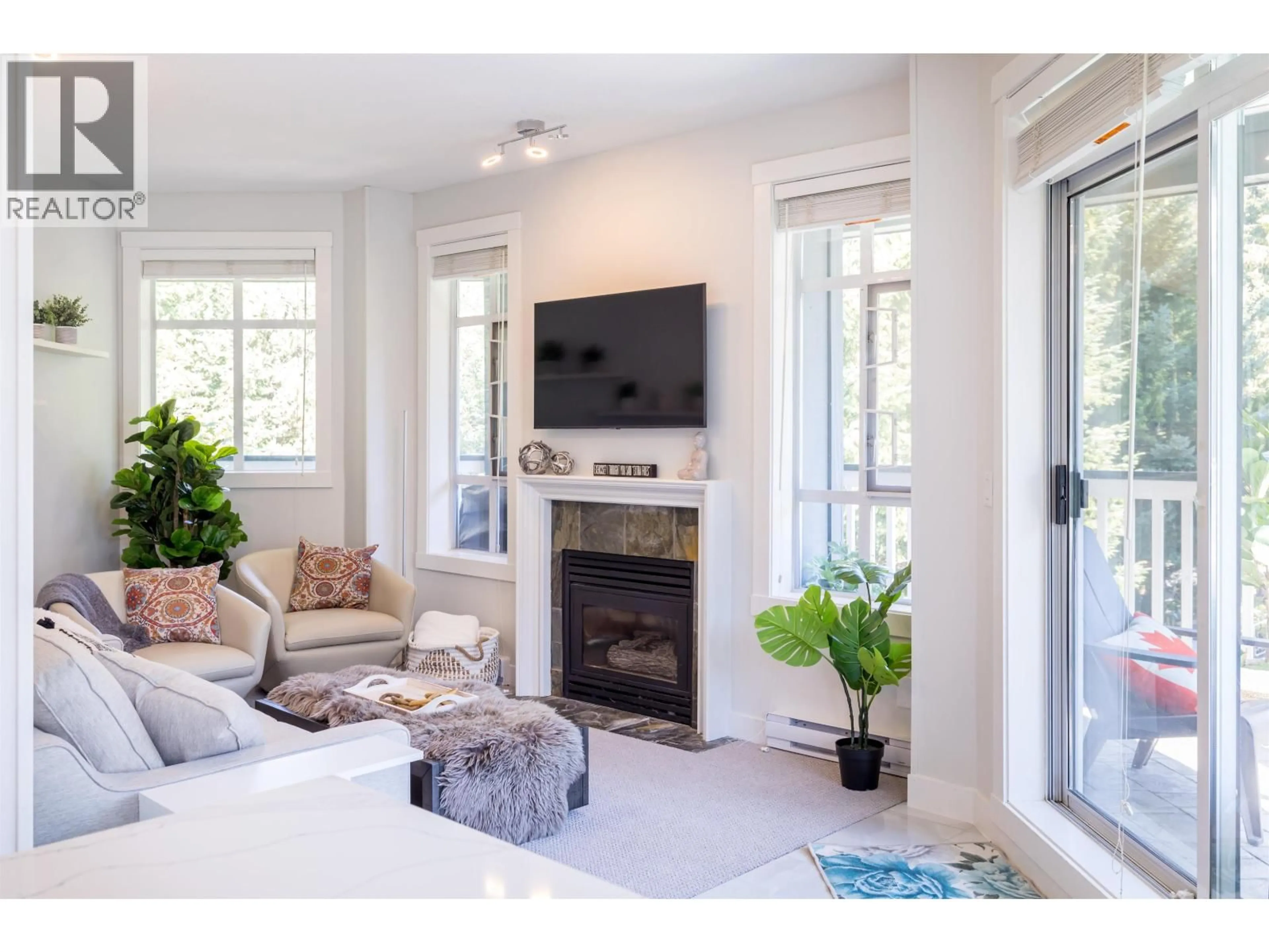 Living room with furniture, unknown for 311 - 4405 BLACKCOMB WAY, Whistler British Columbia V3S9E5