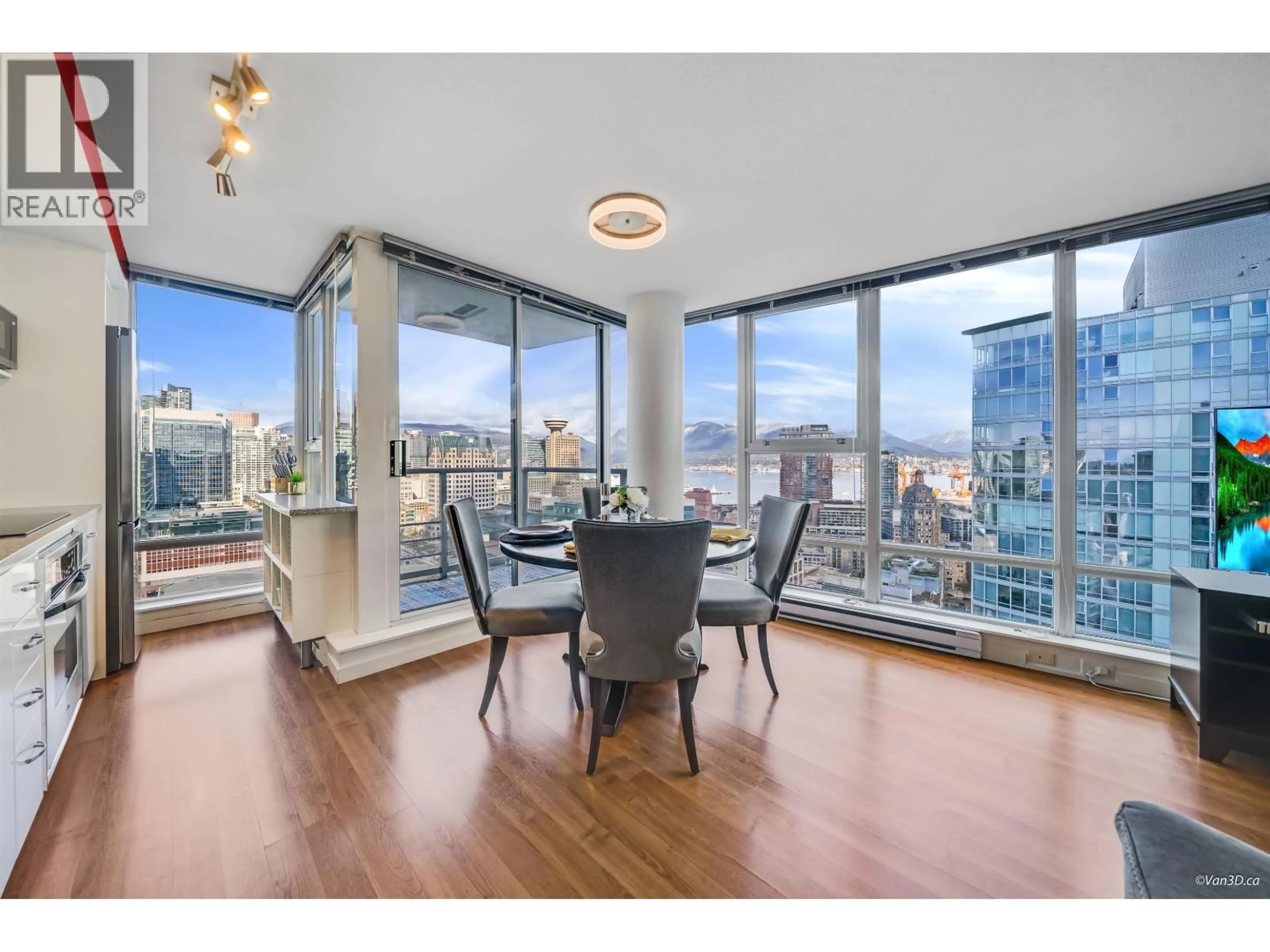 Dining room, wood/laminate floor for 3101 - 668 CITADEL PARADE, Vancouver British Columbia V6B1W6