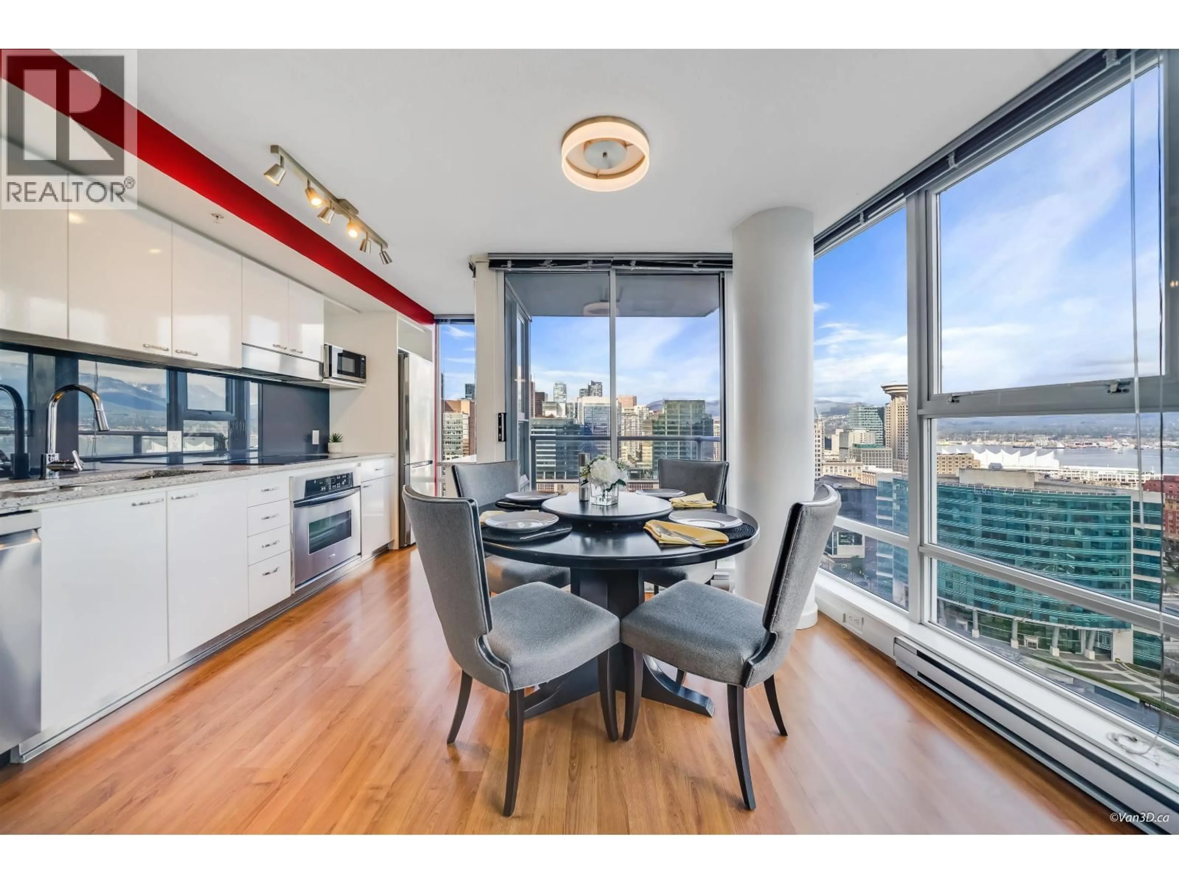 Dining room, wood/laminate floor for 3101 - 668 CITADEL PARADE, Vancouver British Columbia V6B1W6