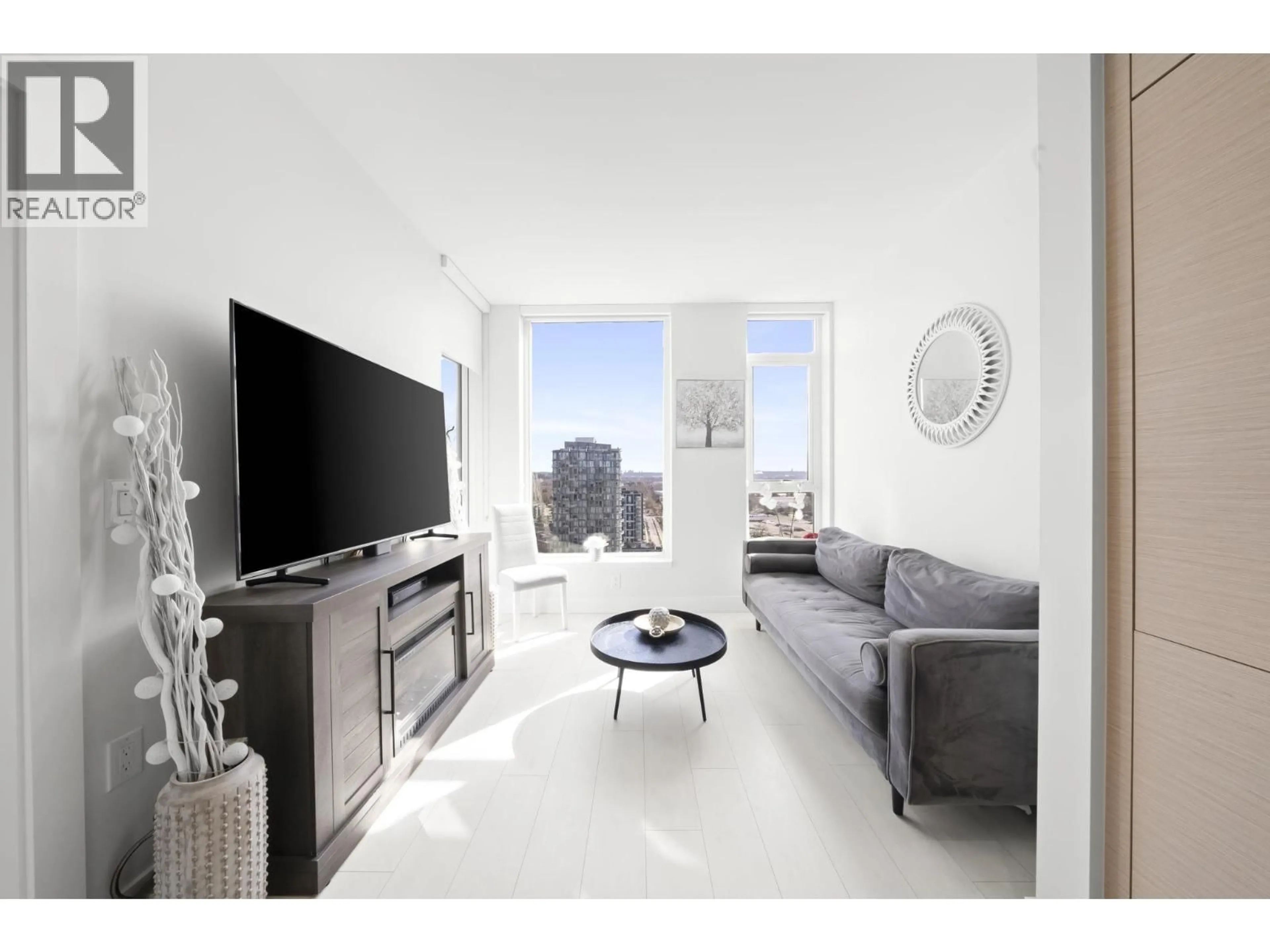 Living room with furniture, unknown for 2201 - 3438 SAWMILL CRESCENT, Vancouver British Columbia V5S0E3