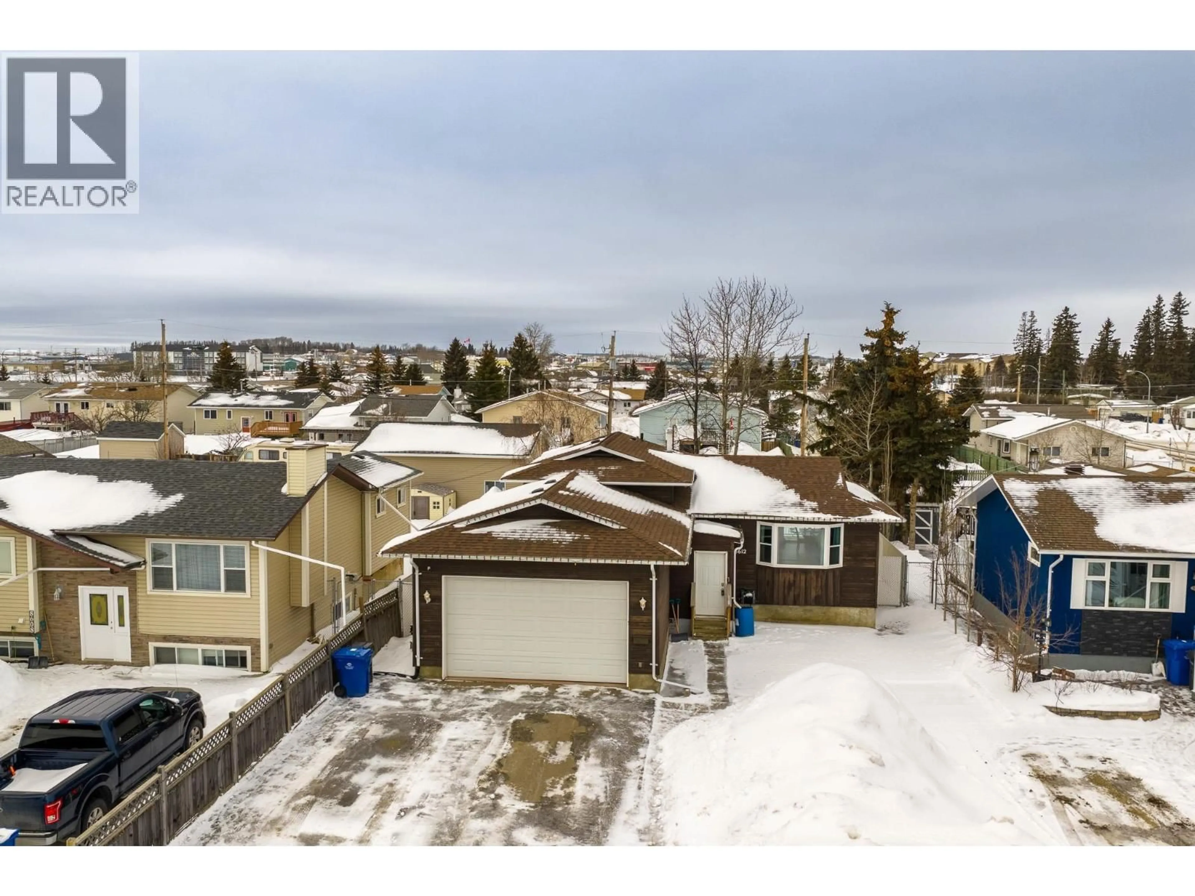 A pic from outside/outdoor area/front of a property/back of a property/a pic from drone, street for 8612 88 STREET, Fort St. John British Columbia V1J6B3