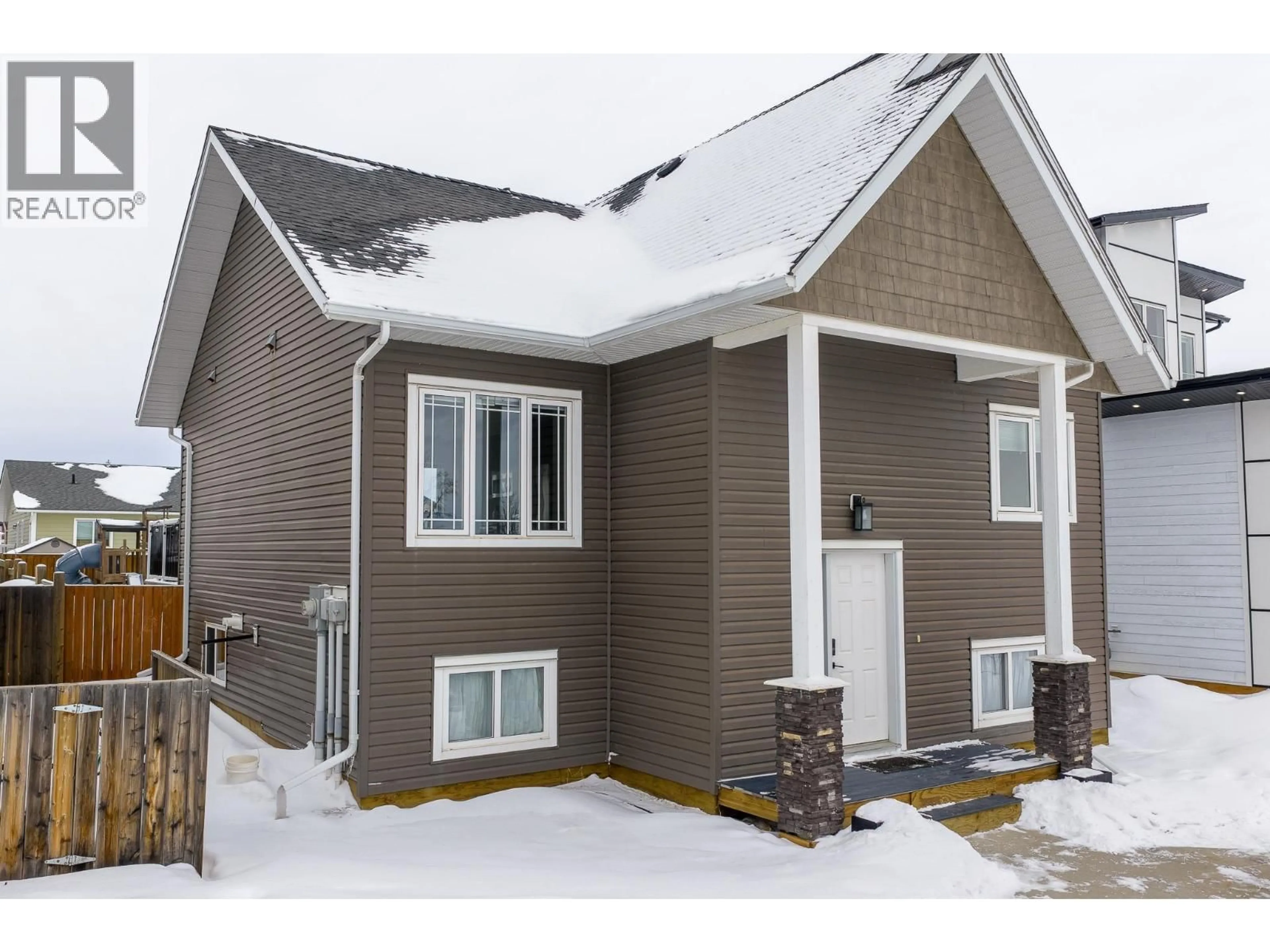 Home with vinyl exterior material, street for 8324 85 AVENUE, Fort St. John British Columbia V1J0G3