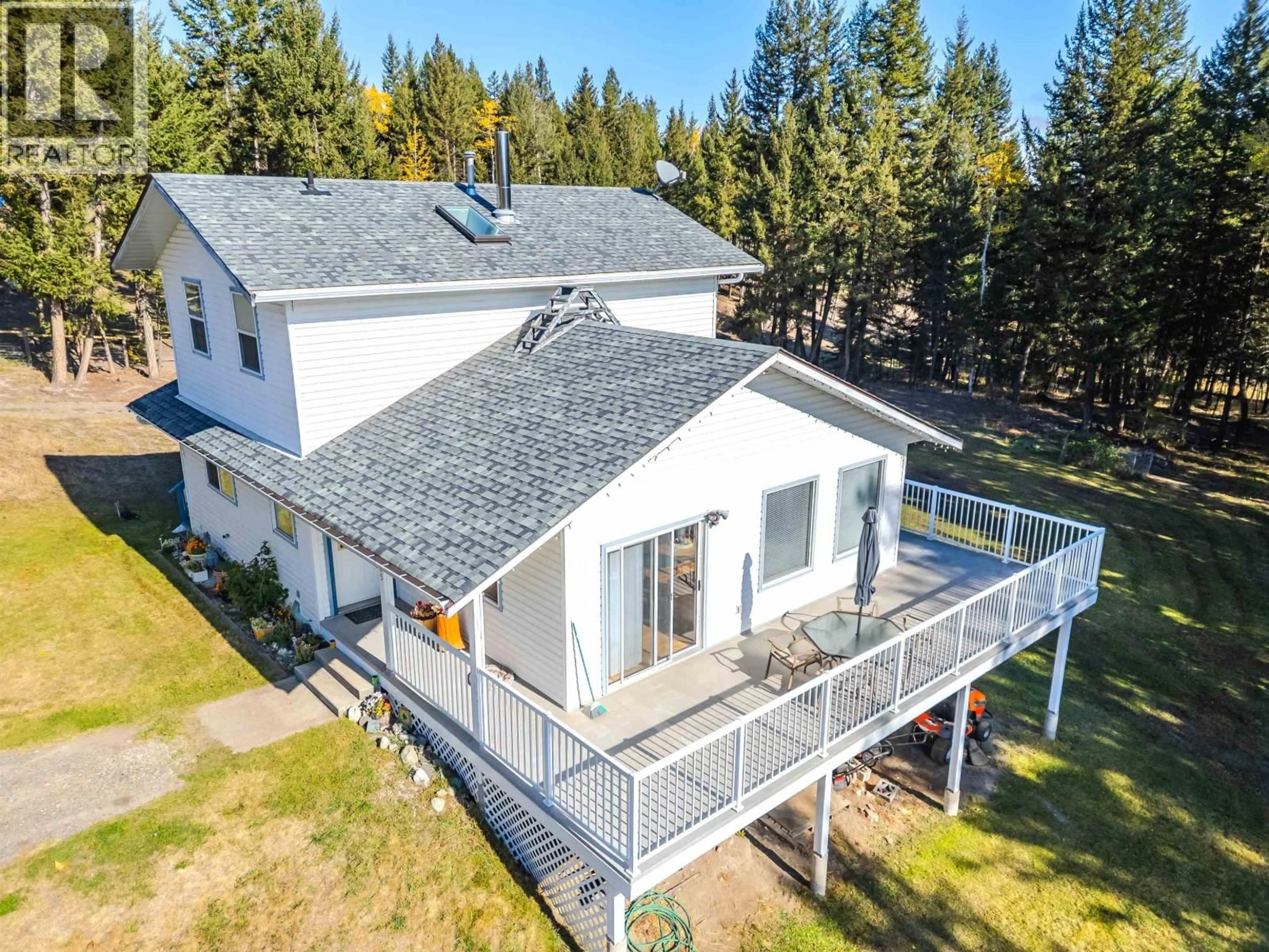 A pic from outside/outdoor area/front of a property/back of a property/a pic from drone, unknown for 5565 BIRCHWOOD ROAD, 100 Mile House British Columbia V0K2E1