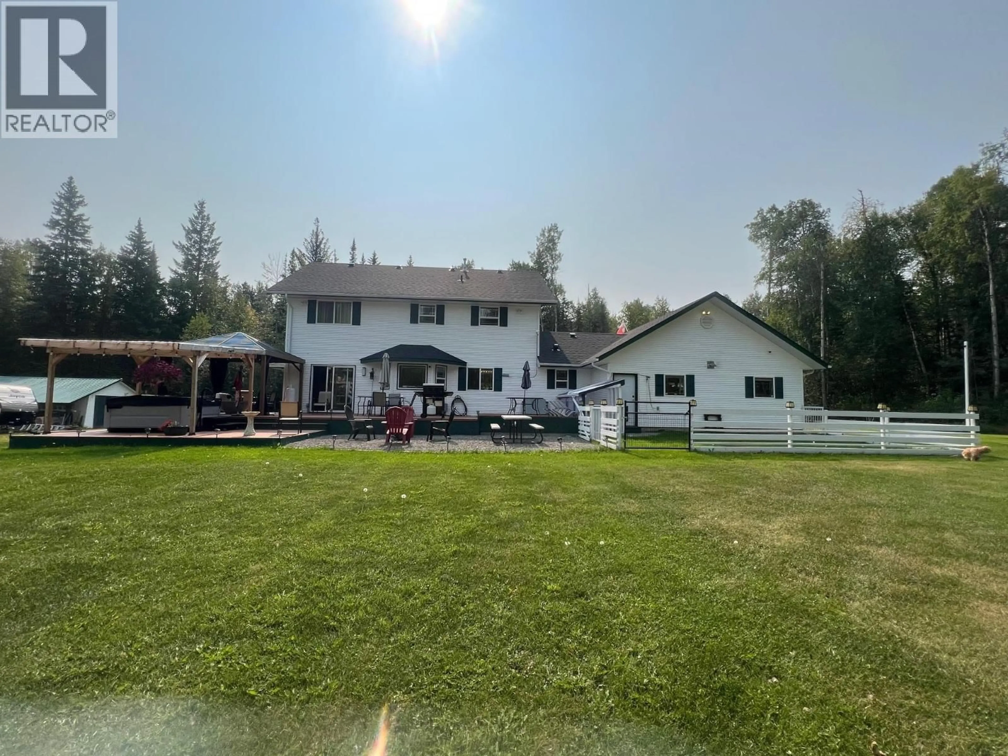 A pic from outside/outdoor area/front of a property/back of a property/a pic from drone, unknown for 5060 AVRIL ROAD, Prince George British Columbia V2M7C5