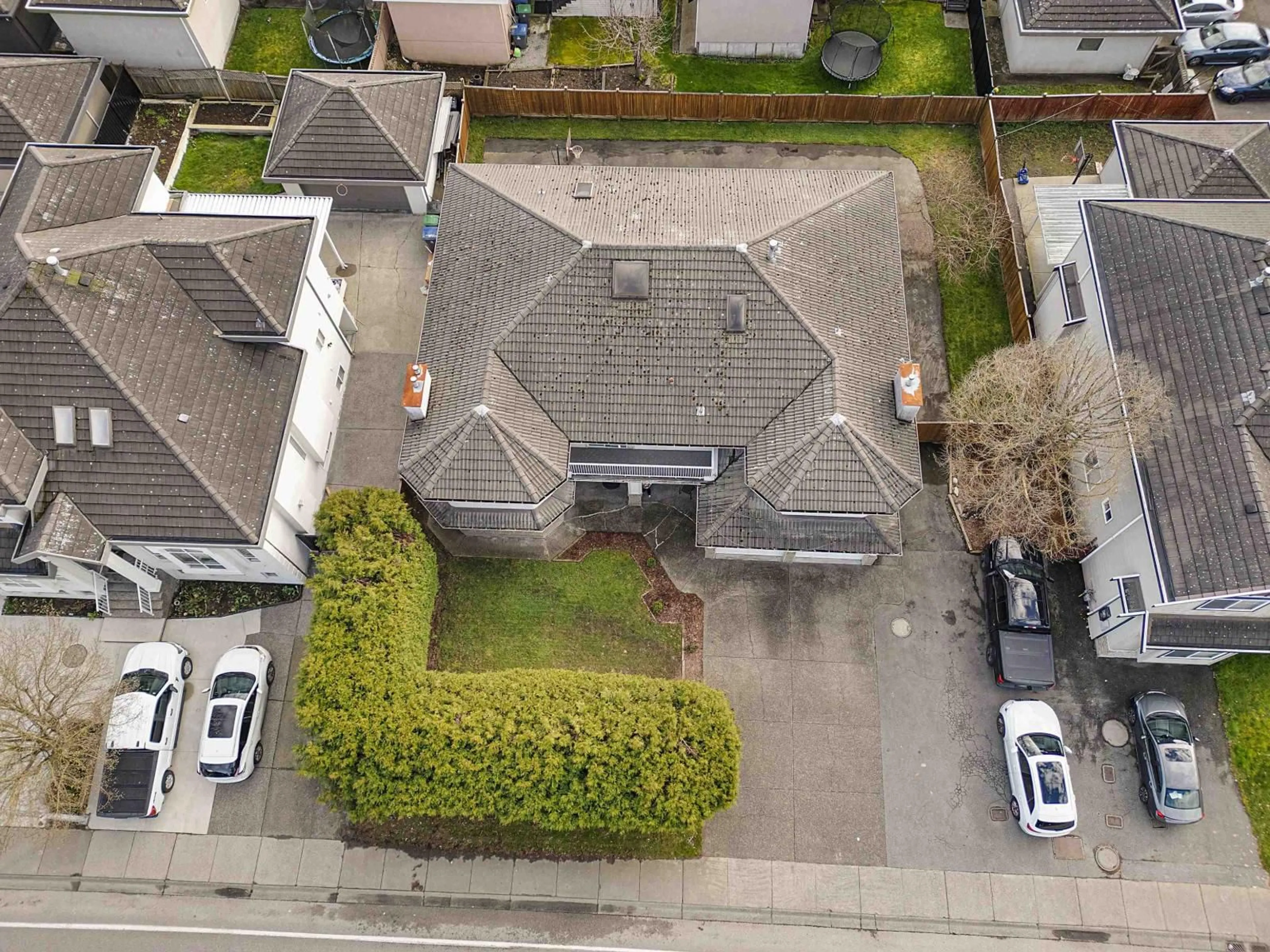 A pic from outside/outdoor area/front of a property/back of a property/a pic from drone, street for 12604 68 AVENUE, Surrey British Columbia V3W1G4